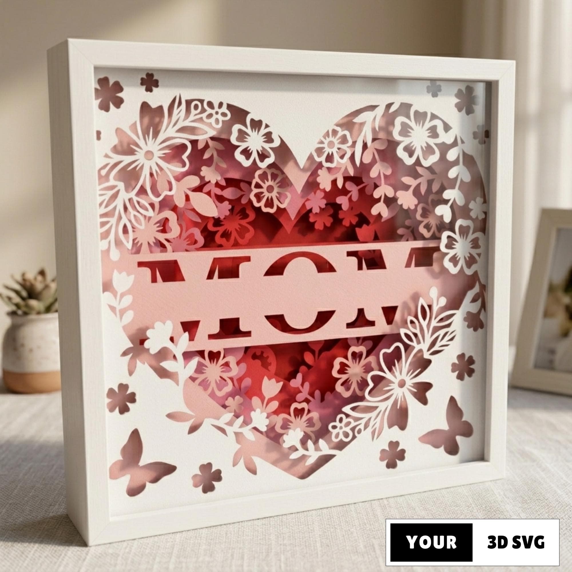 3D Customizable Mom Shadow Box SVG, Heart Floral Layered Papercut, Custom Name Mother's Day Lightbox Template, Cricut Silhouette Floral Gift
A 3D layered papercut design featuring a large heart filled with intricate floral patterns and butterflies. A central banner displays the word MOM, with space to add custom names using the included alphabet SVG. The design uses soft pink and vibrant red tones for a DIY light box.