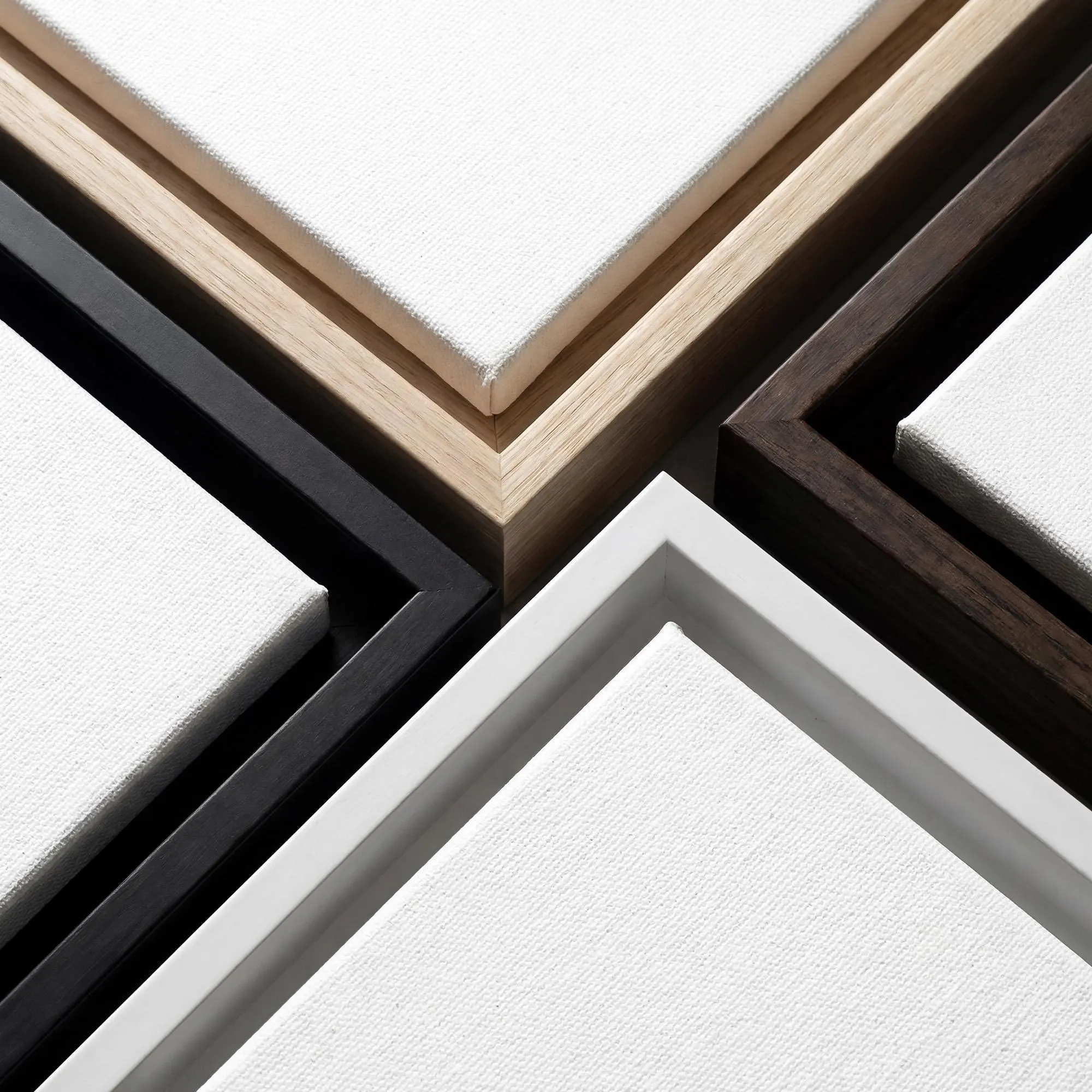 The image is a collage of framed canvas artworks, showcasing various sizes, frame colors, and materials.