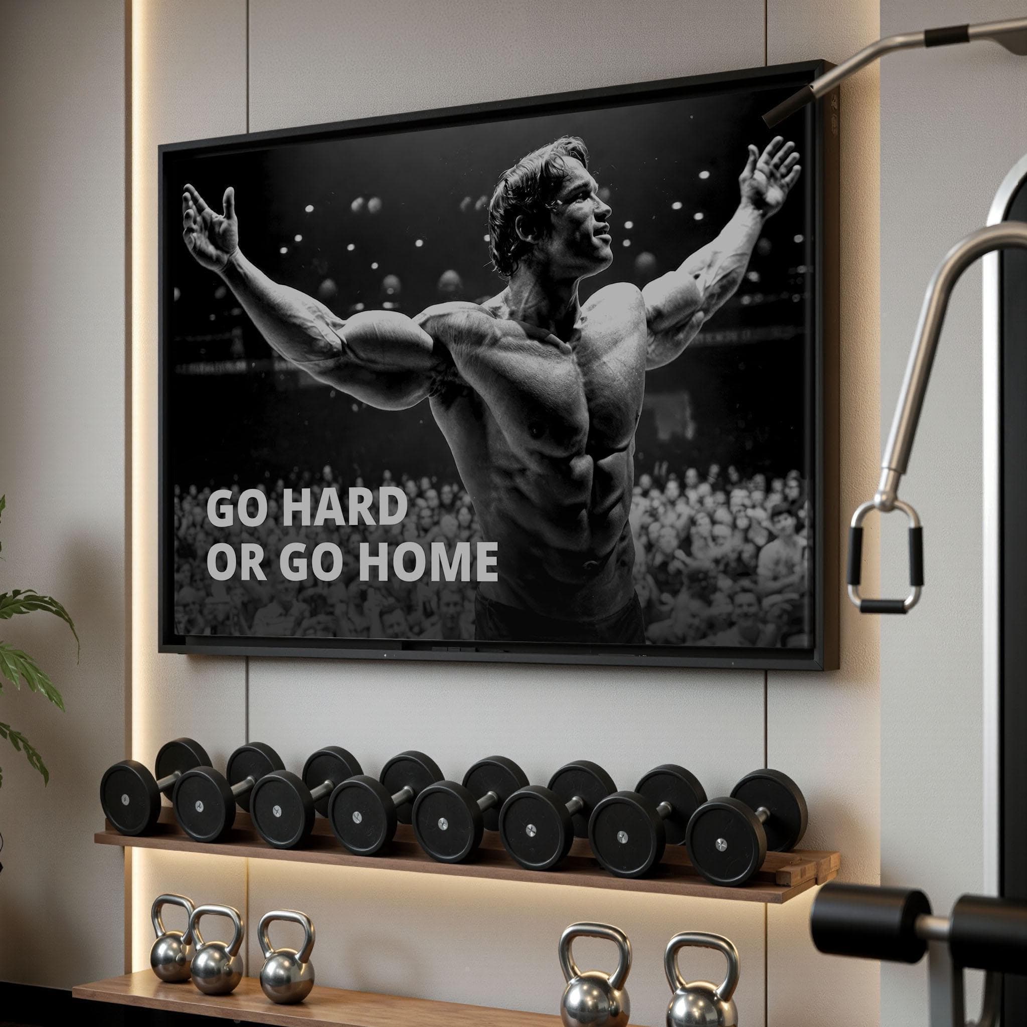 Iconic black and white bodybuilding canvas featuring Arnold Schwarzenegger with motivational text Go Hard Or Go Home in a home gym setting.