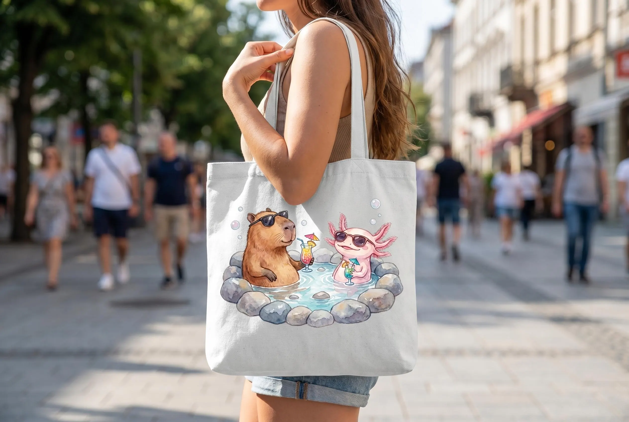 Tote bag with Capybara Axolotl PNG — cute watercolor capybara and pink axolotl in black sunglasses sitting in a stone hot spring holding cocktails, "This Is Productive Actually" retro script above. Funny meme shirt capybara clipart design placement example.