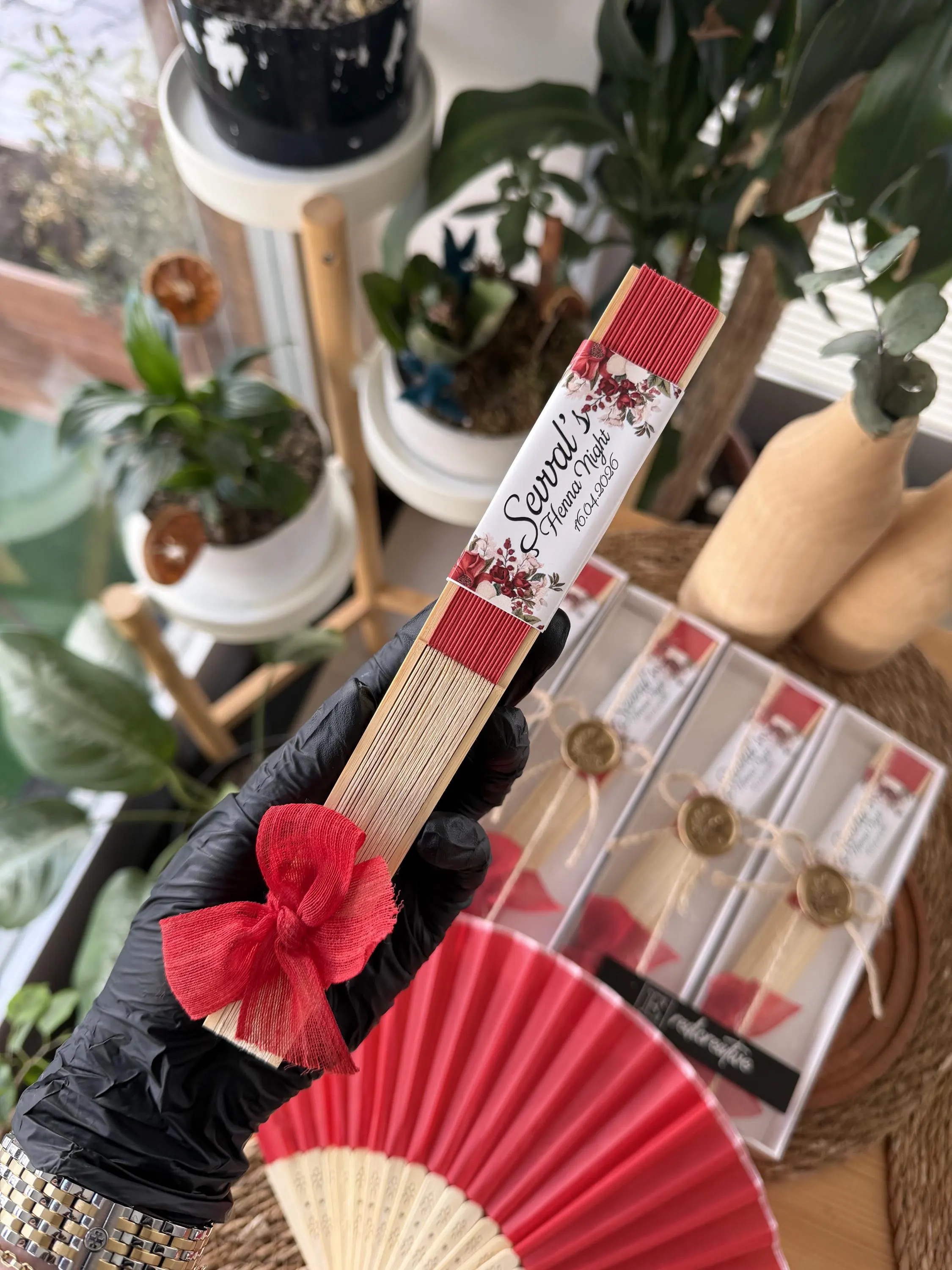 personalized fabric hand fan inside custom gold wax seal gift box with red bow for summer wedding guest gifts