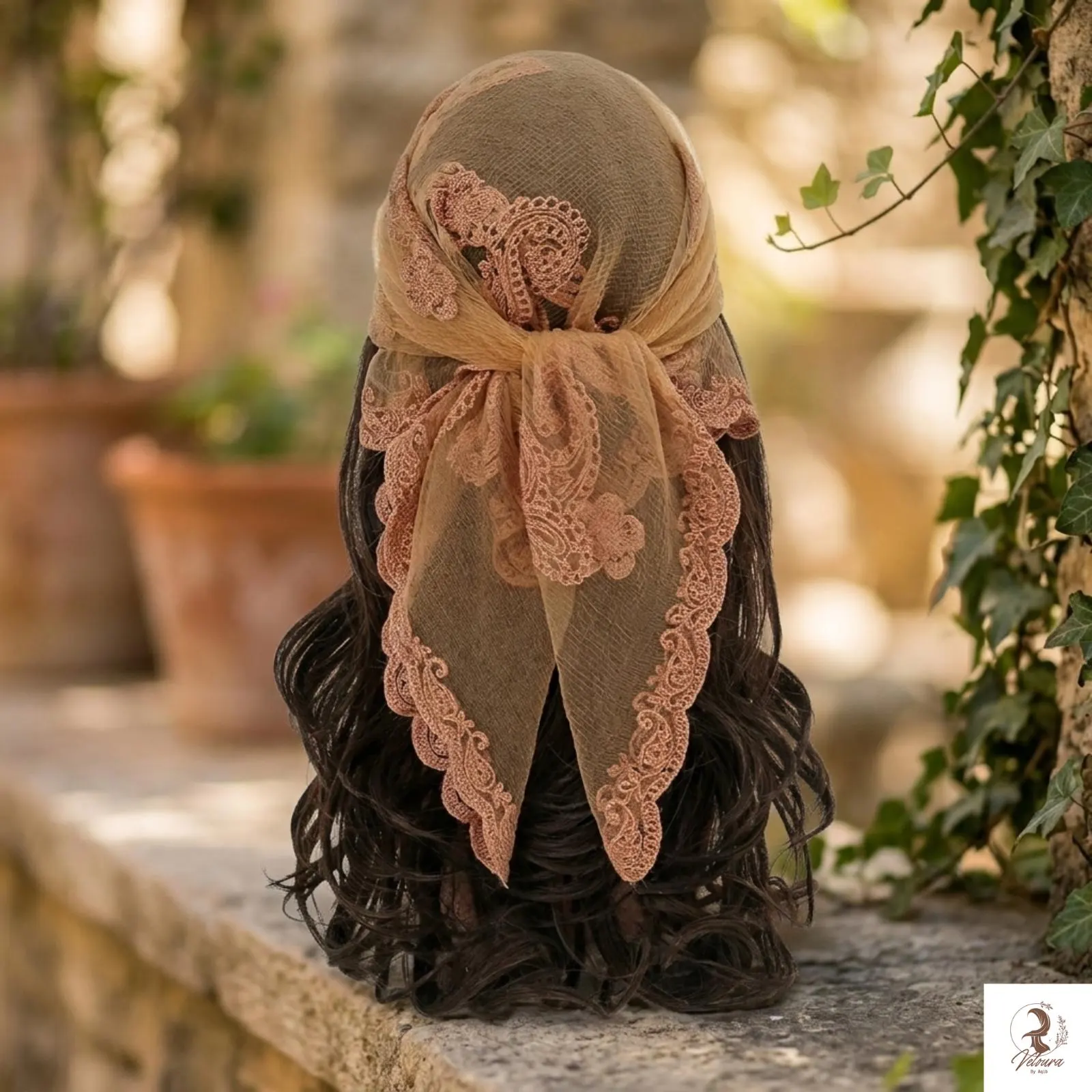 Woman wearing embroidered scarf tied elegantly around her neck