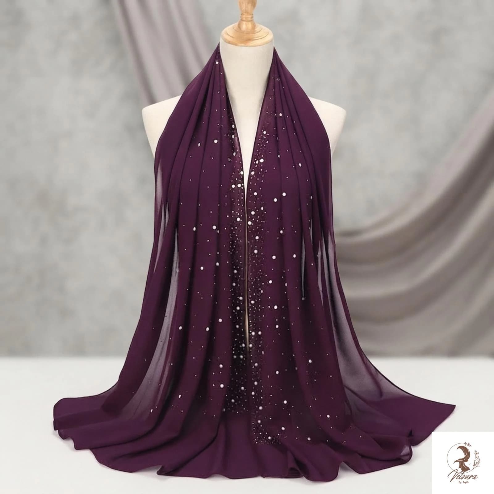 Plain chiffon scarf with delicate pearl detail styled as a women's hijab