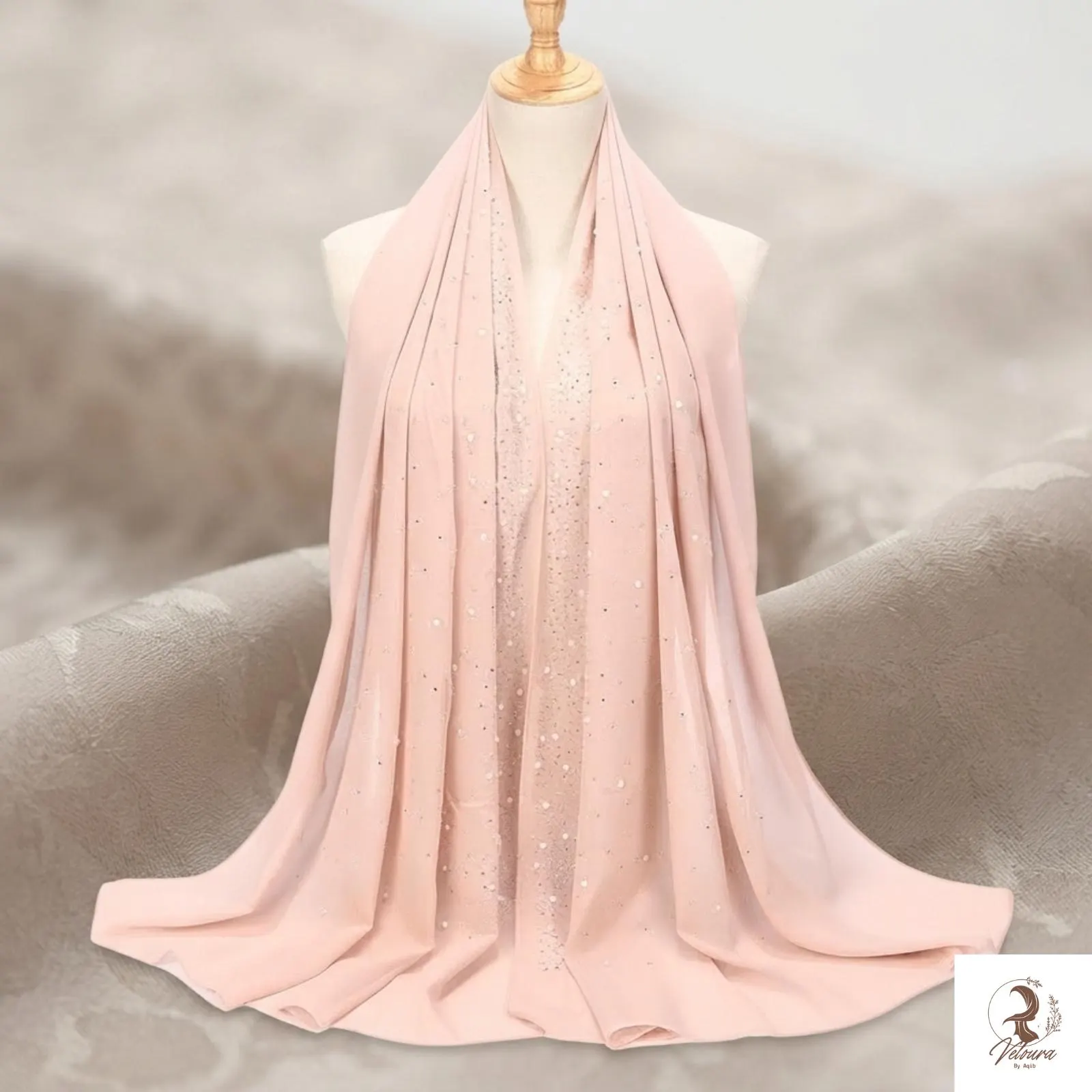Elegant pearl scarf arranged neatly around the head