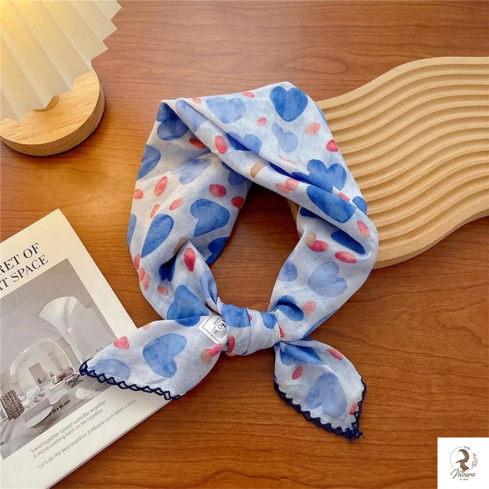 Lightweight square scarf worn as a headband for everyday fashion