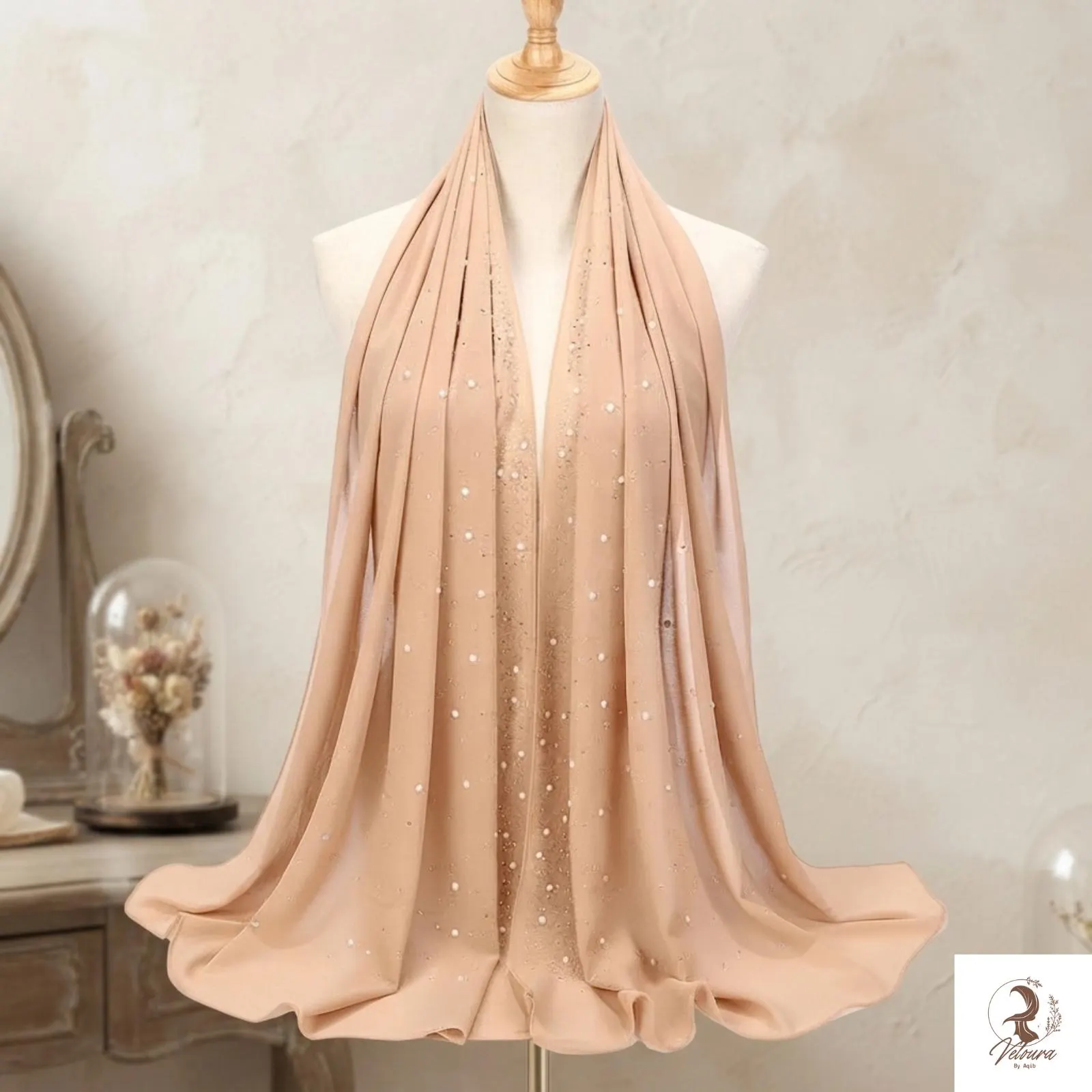 Lightweight scarf draped gracefully over the shoulders