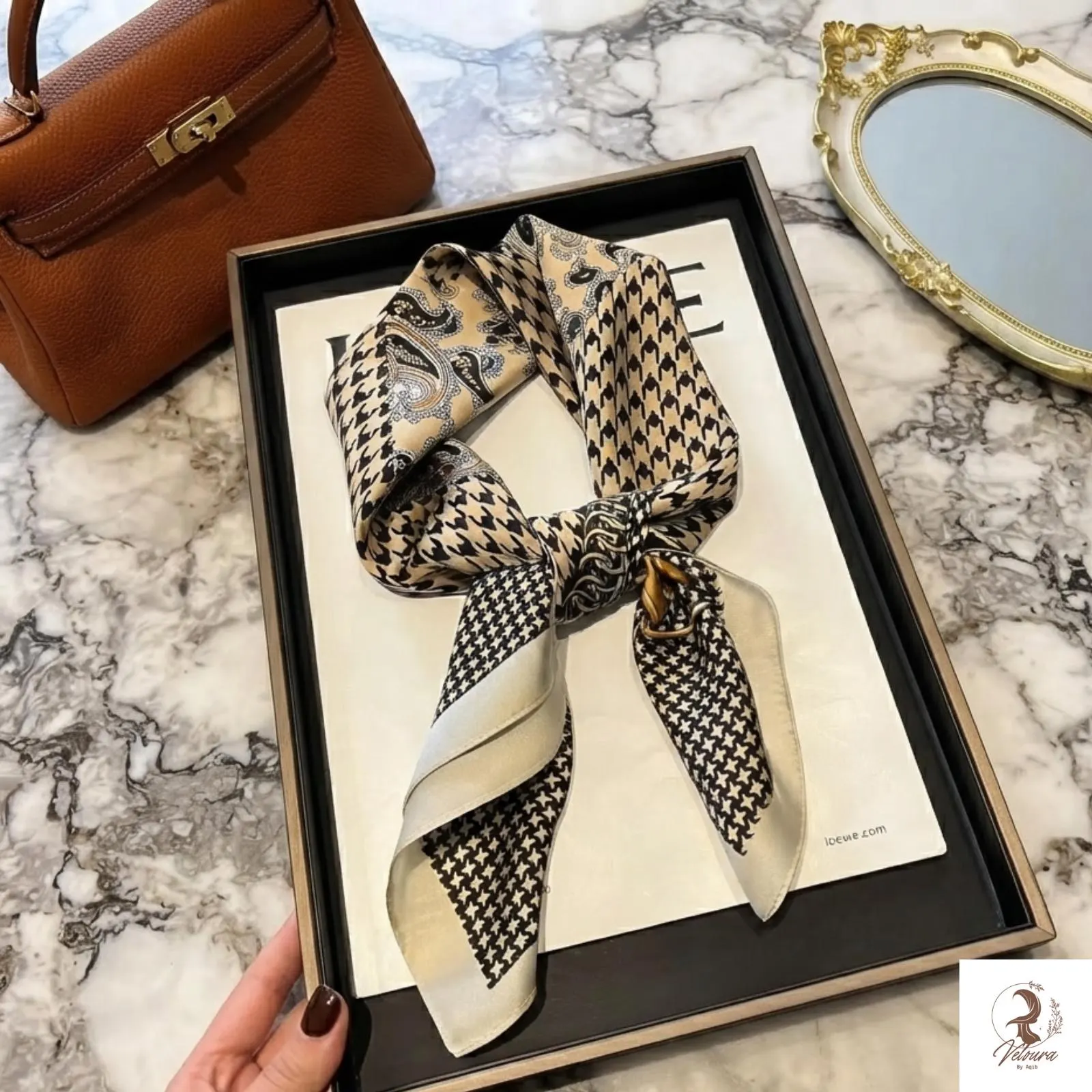Elegant satin neck scarf paired with a classic blazer.