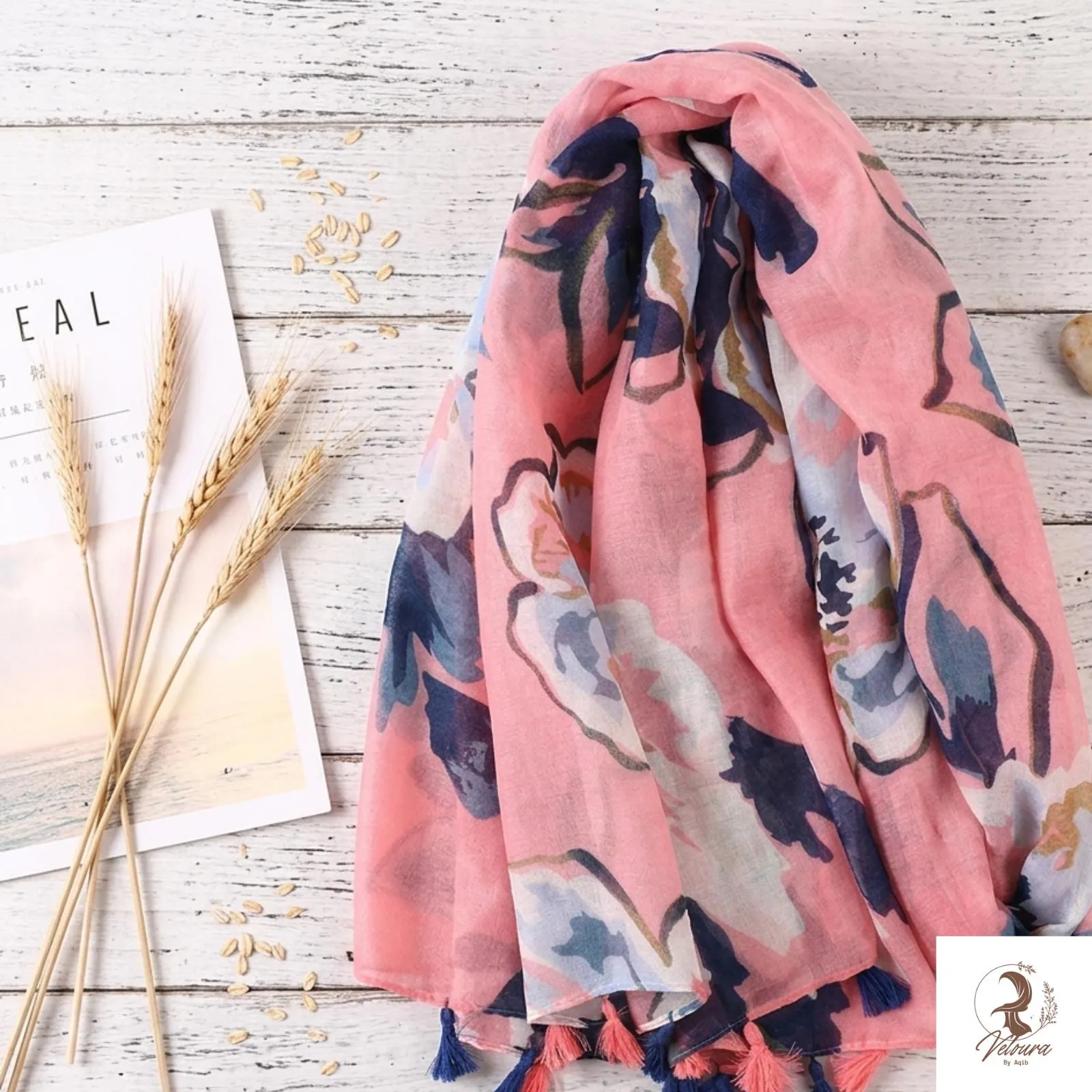 Lightweight women's scarf featuring elegant printed pattern and fringe