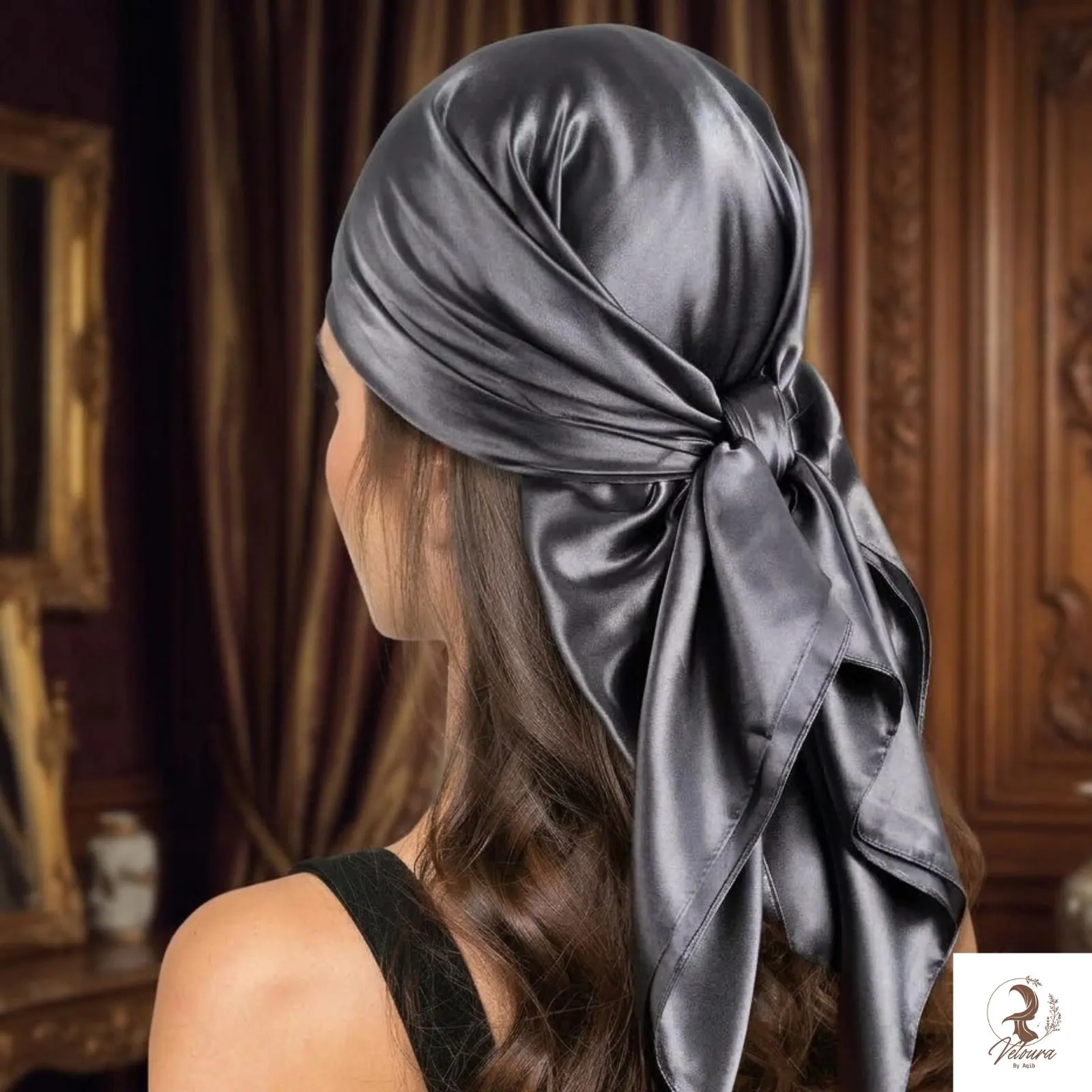 Women's scarf draped loosely around the neck