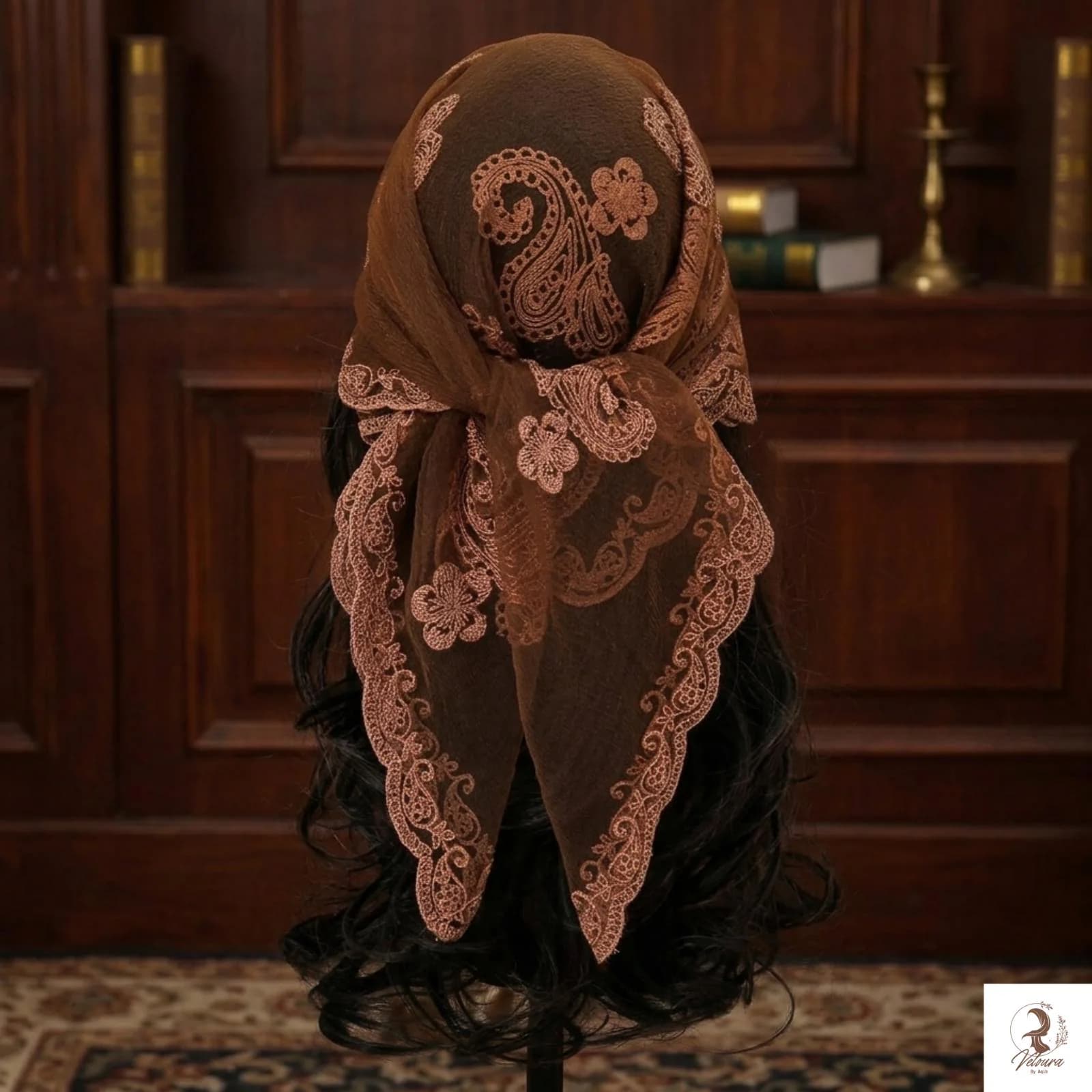 Lightweight square scarf styled as a fashionable hair accessory
