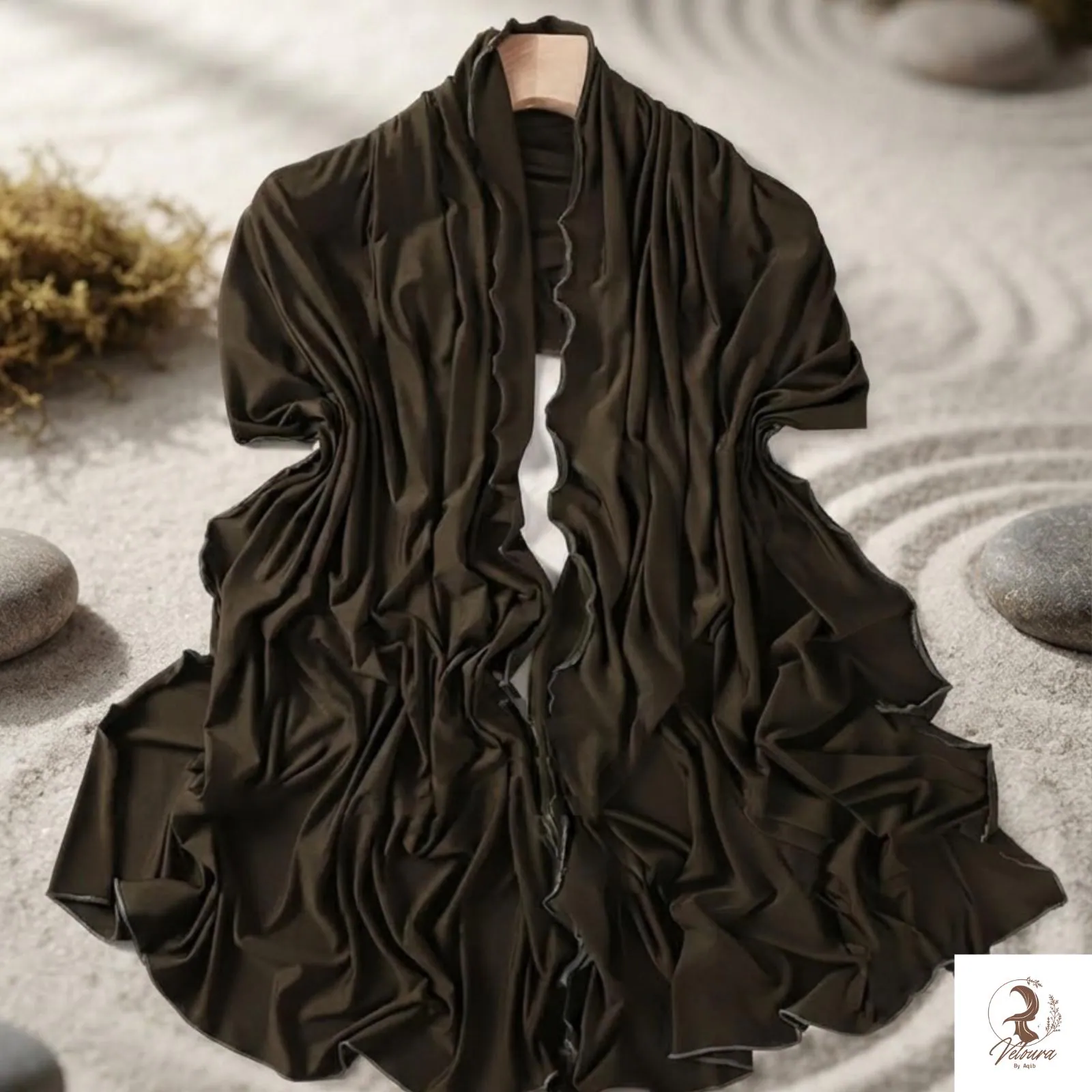 Women's modest headscarf styled for a simple everyday outfit.