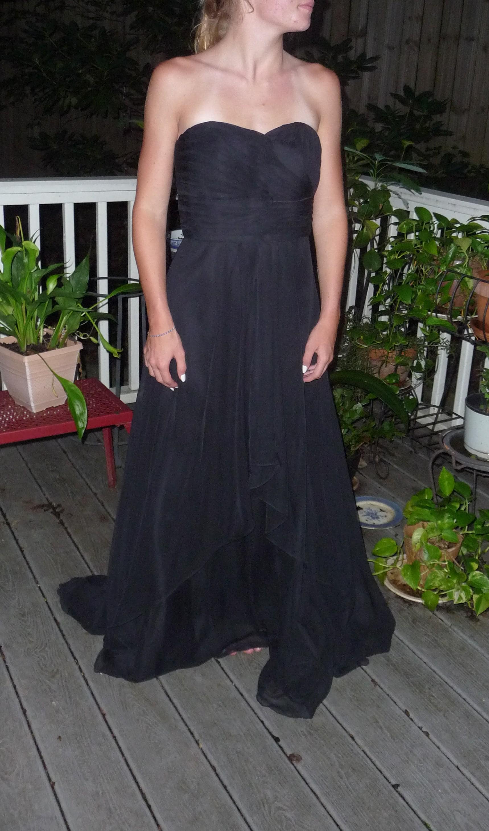 elegant strapless long black formal dress,  layers of black crepe in the front, Diagonal folds at the bust, flattering size 10,