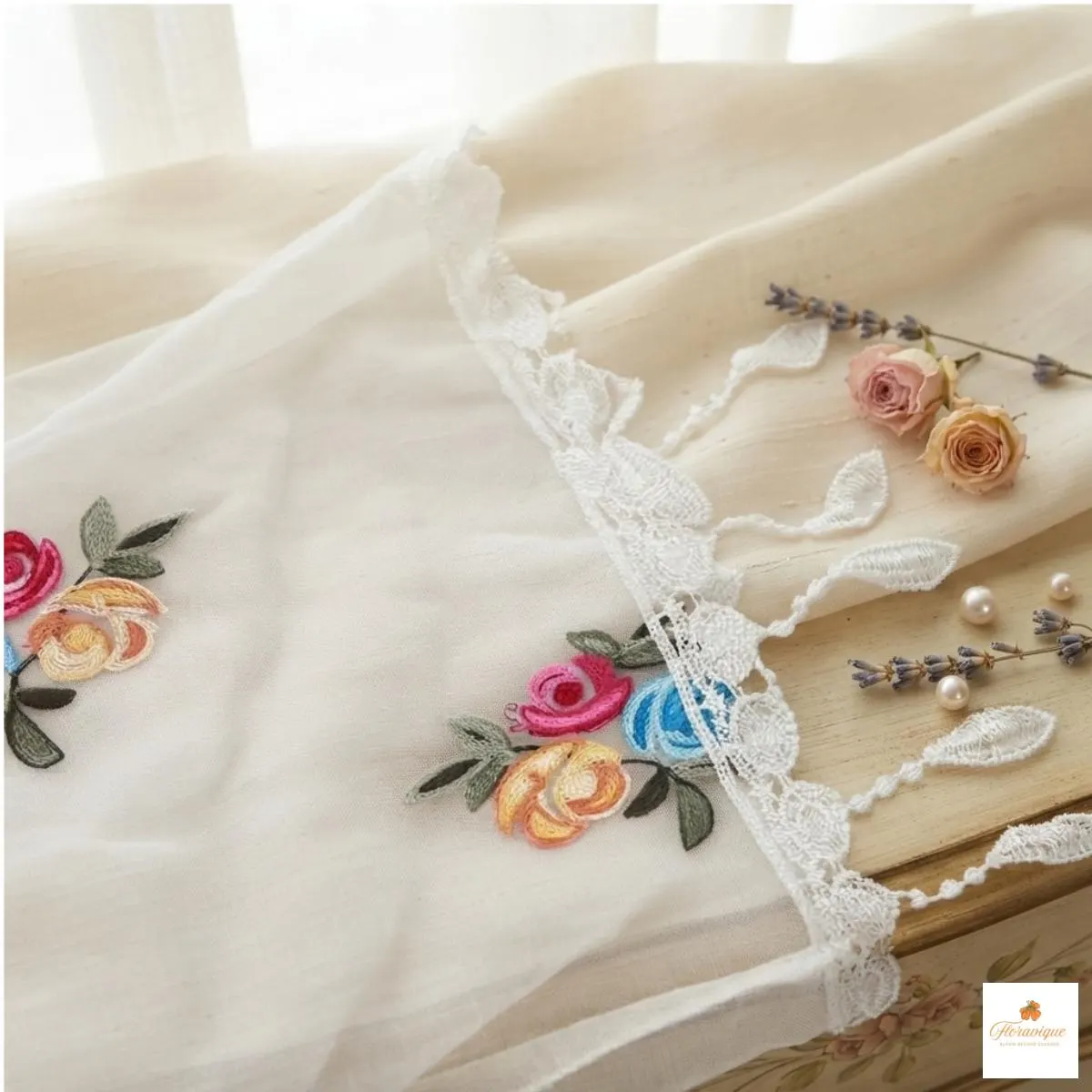 Triangle lace scarf styled over the shoulders for a special occasion
