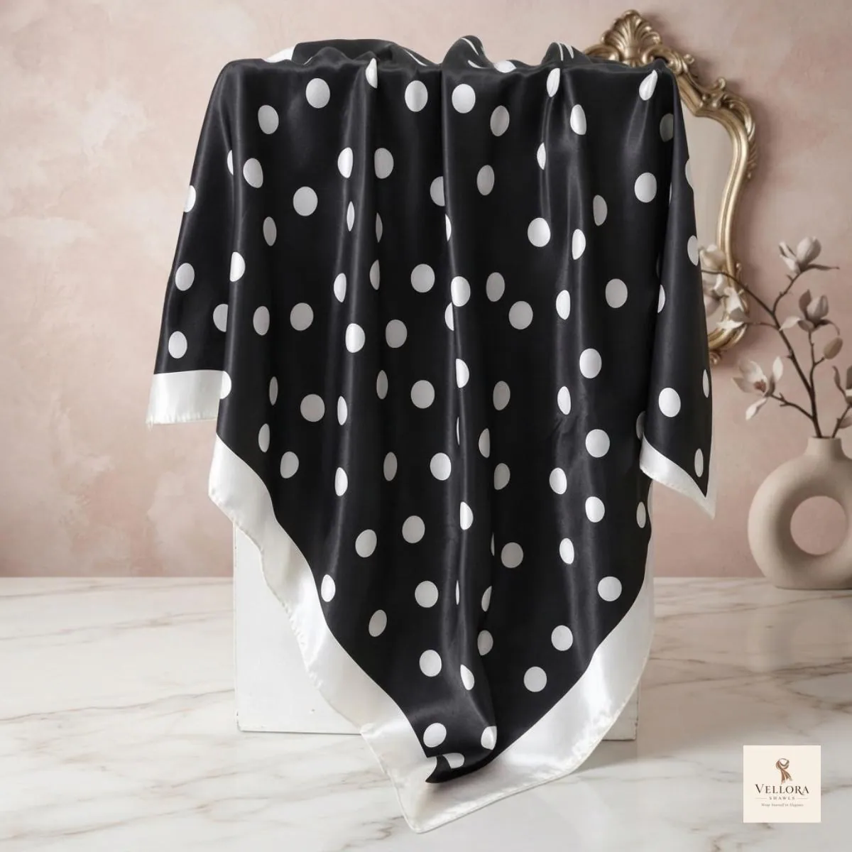 Polka dot scarf folded into a neat head wrap