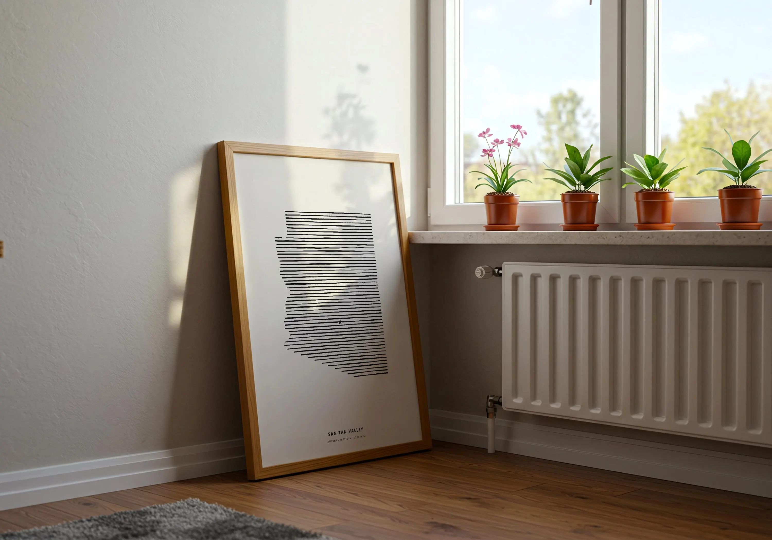 Modern state silhouette print of San Tan Valley, Arizona resting on a warm hardwood floor.