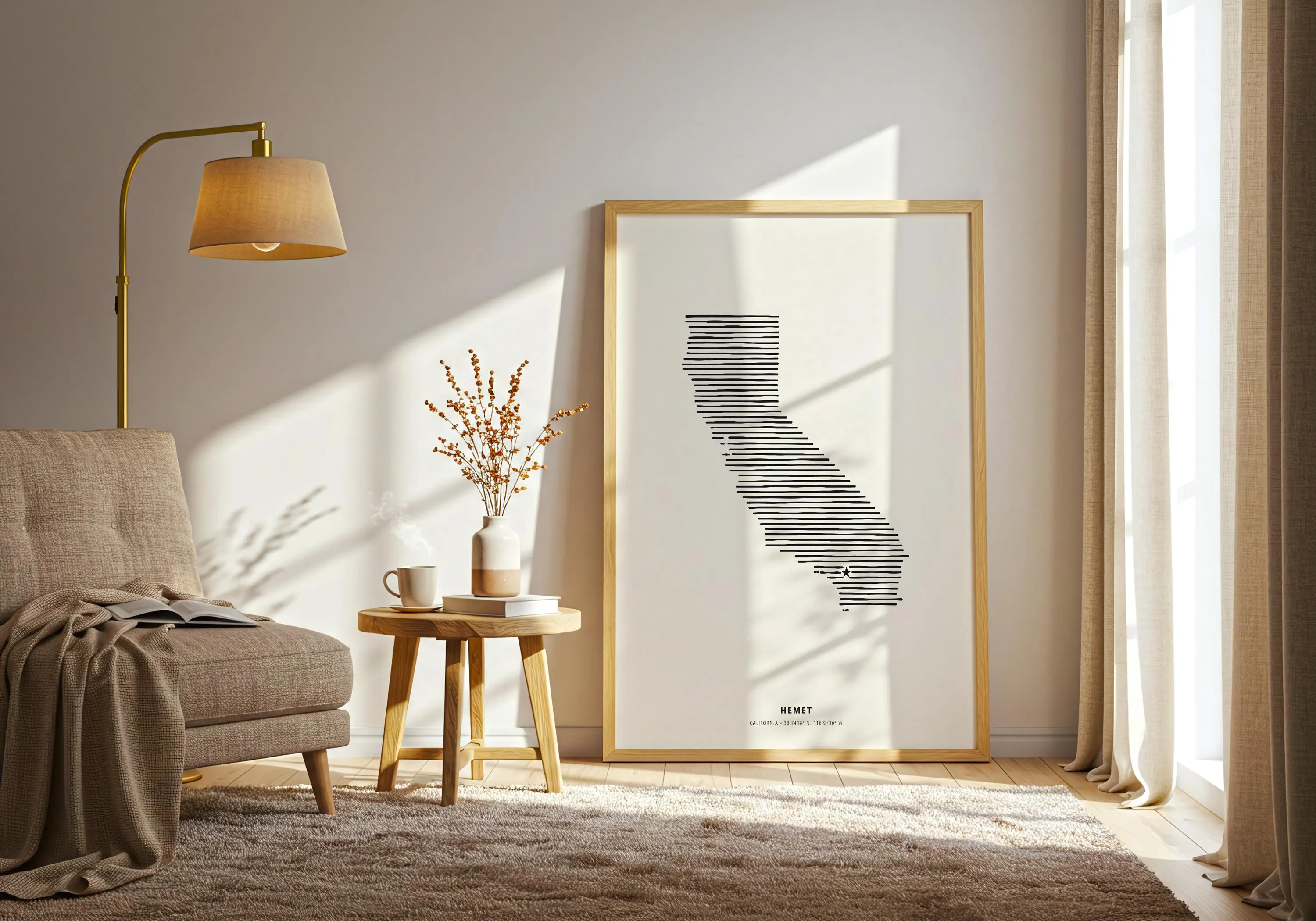 Close up of the Hemet star location marker on a minimalist California state silhouette poster inside a natural wood frame.