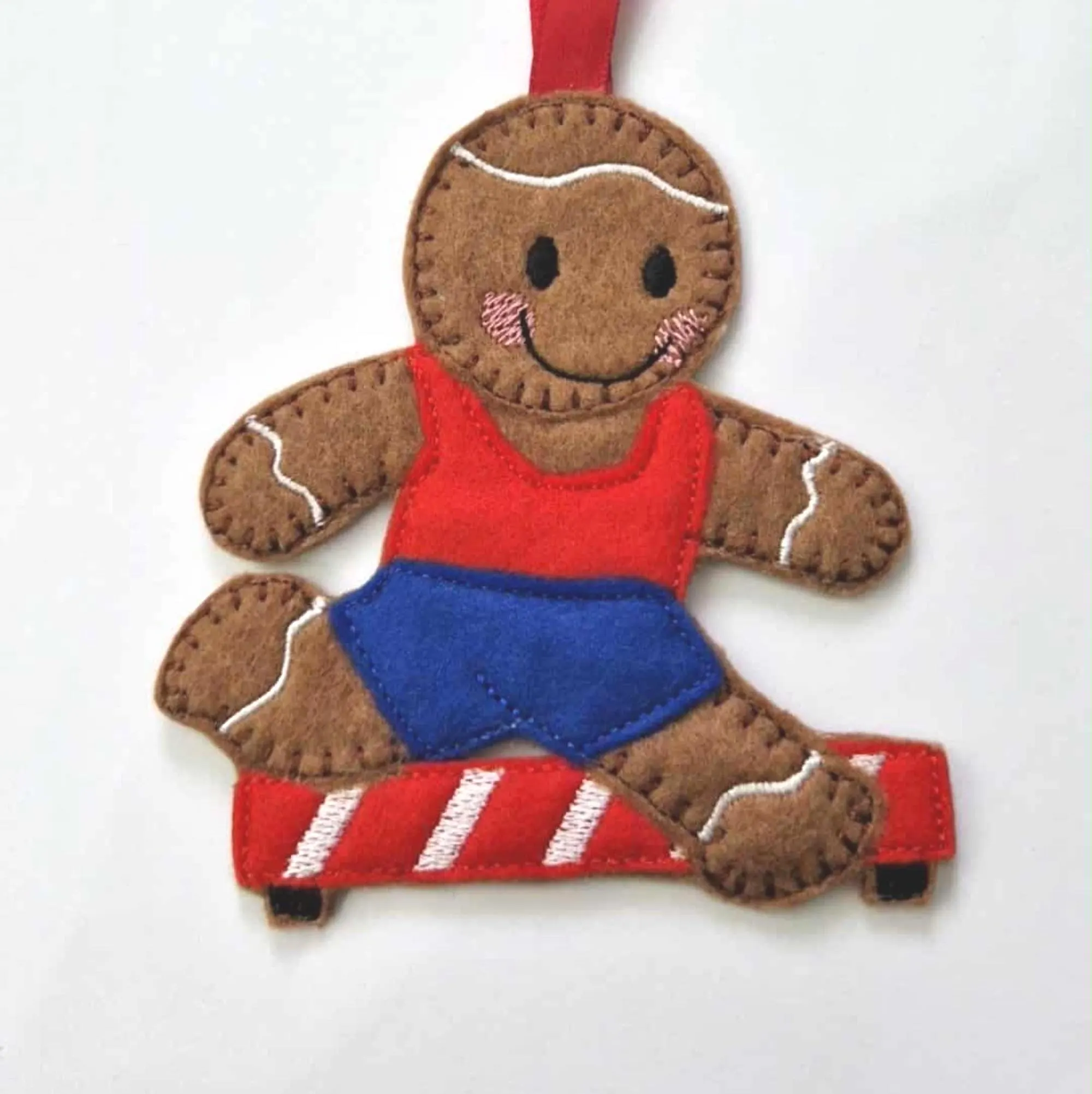 Hurdler Athlete racing Gingerbread decoration. Hanging Decoration.