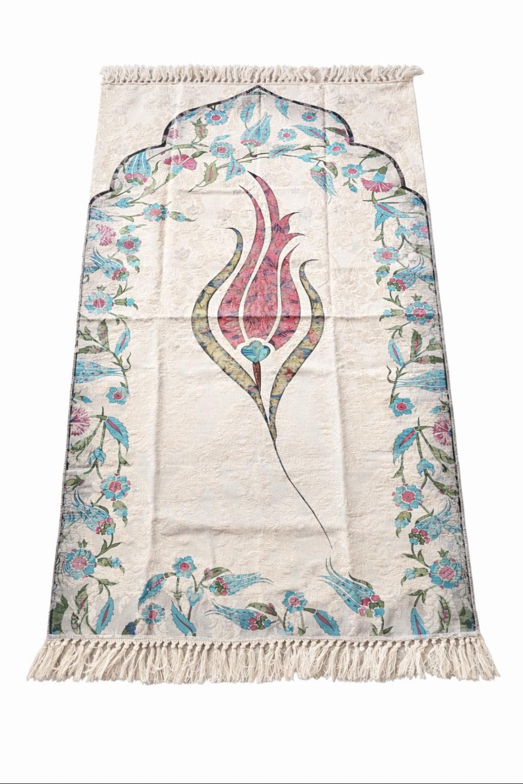 "Islamic prayer set with turquoise Quran cover featuring gold Arabic 'Allah' calligraphy, blue tasbih prayer beads with tassel, placed on a floral patterned prayer rug with fringe, elegant Muslim gift set