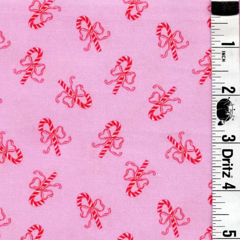 Quilt Fabric BY THE YARD Sale Bargain Clearance Adorable Bows tied on Candy Canes  light Pink  Background 100% cotton quilting fabric