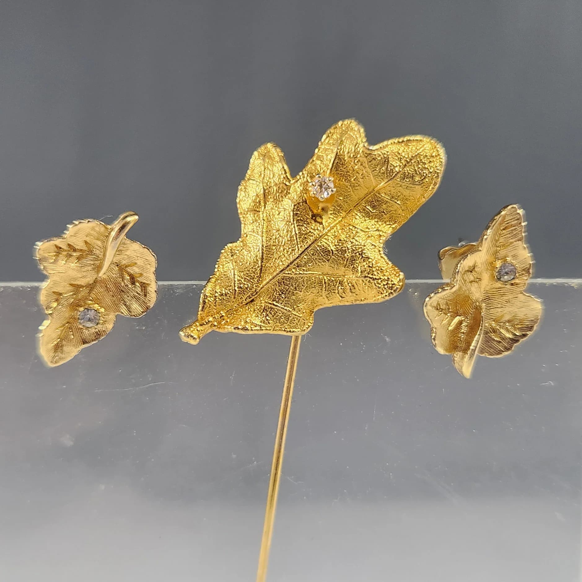 3 pc. Gold Tone Leaf Post Earrings & Stick Pin Set w Faux Diamond Accent Avon Vintage Costume Jewelry