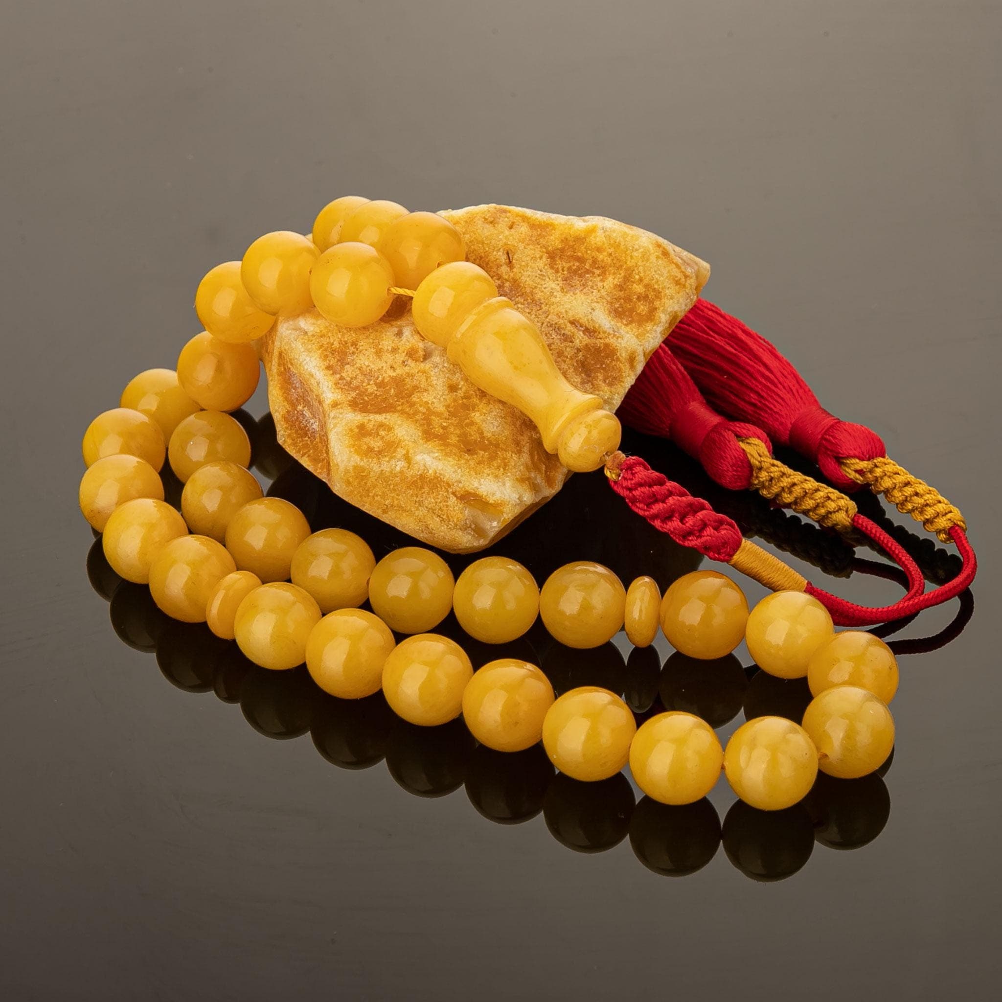 Honey Baltic Amber Tasbih – 33-Bead Islamic Prayer Rosary with Red Tassel