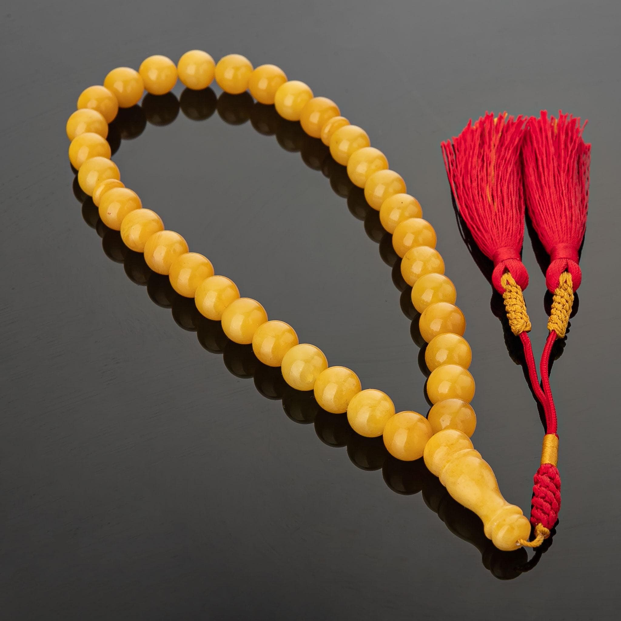 Honey Baltic Amber Tasbih – 33-Bead Islamic Prayer Rosary with Red Tassel - image 3