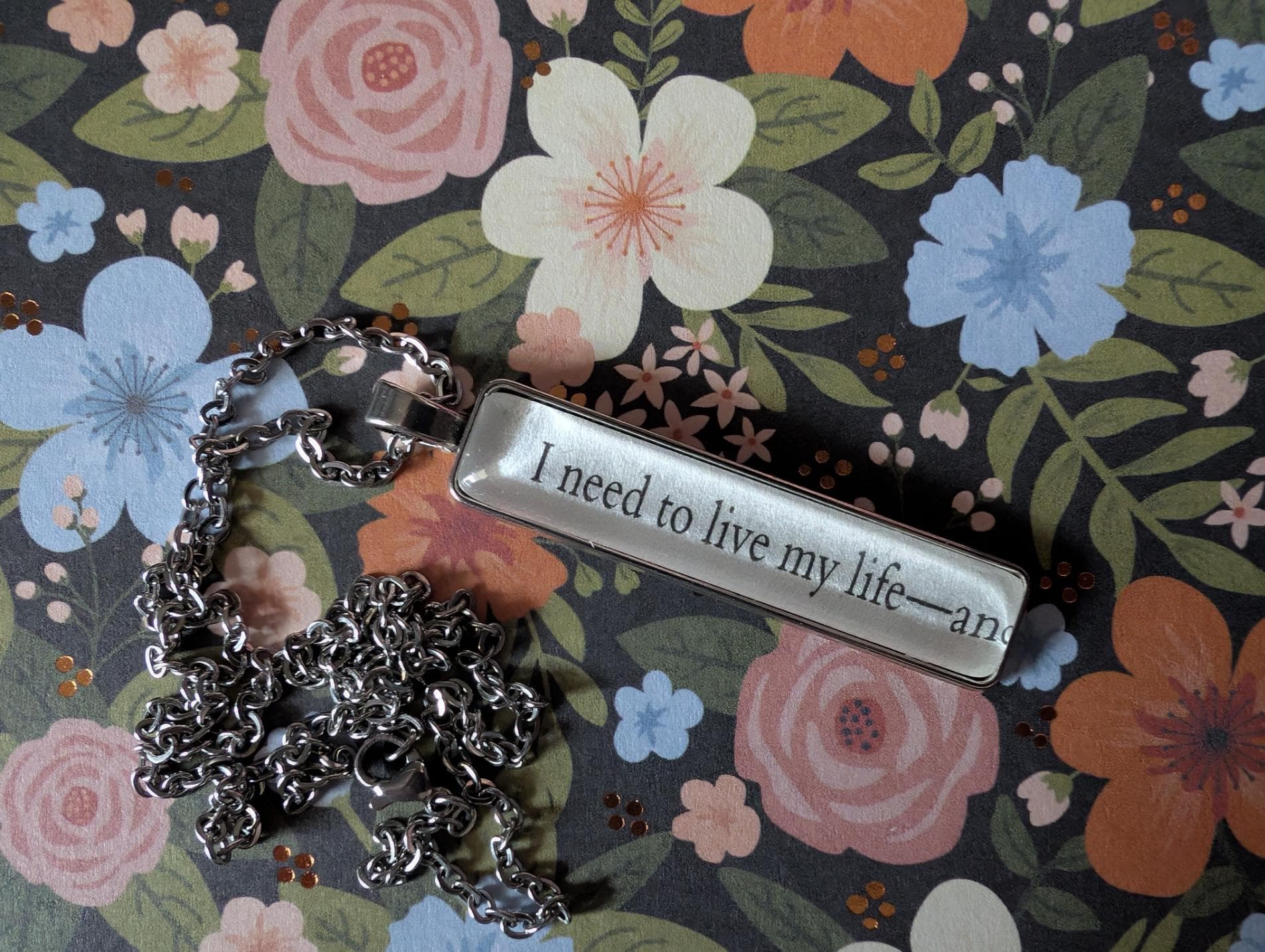 I Need to Live My Life necklace made with Survivor Wants to Die at the End book pages