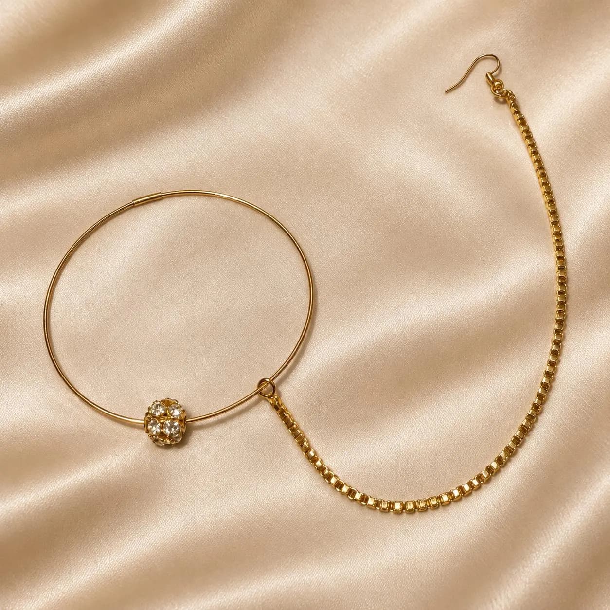 Close up of invisible lock style on gold plated Indian Pakistani bridal nose ring