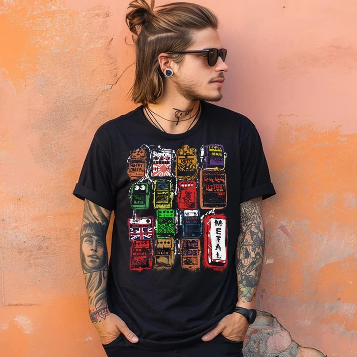 Male model wearing the Distortion Pedal T-Shirt, holding electric guitar, rocker vibe outdoors