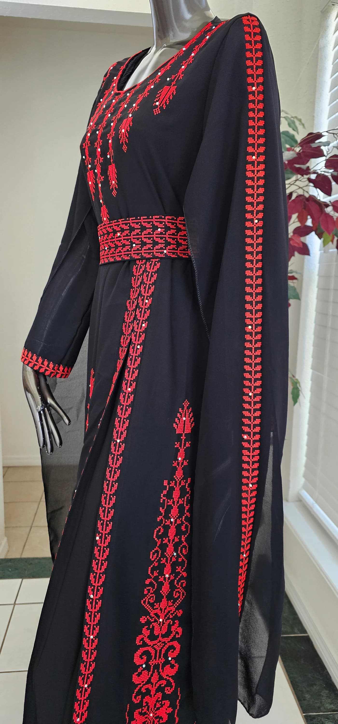 An Elegant Black Jordanian Palestinian Thobe Dress Kaftan Abaya with Red Embroidery tatreez from the front and cape on sleeves with a belt