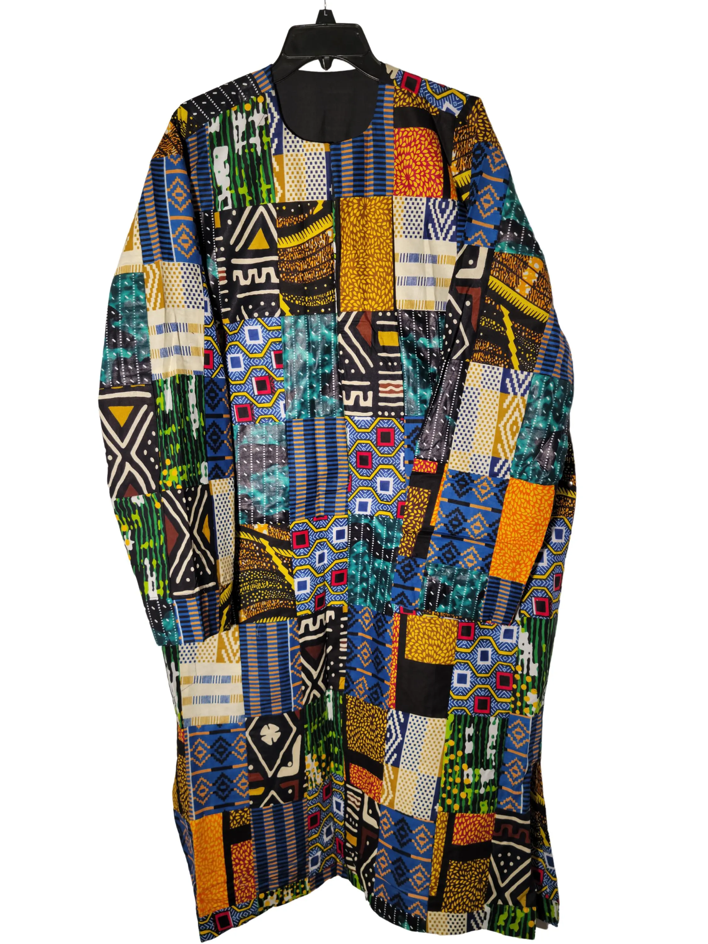 May include: A long-sleeved, colorful, patterned robe with a black collar. The robe is made of a patchwork fabric with various geometric designs in shades of blue, green, yellow, orange, and brown.