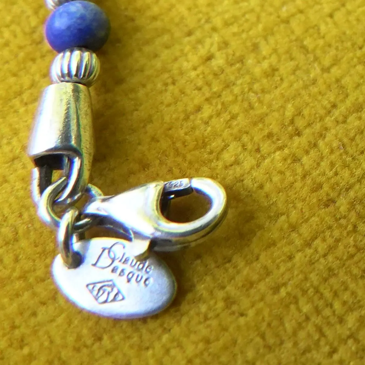 Lobster claw & Claude Dasque silver tag