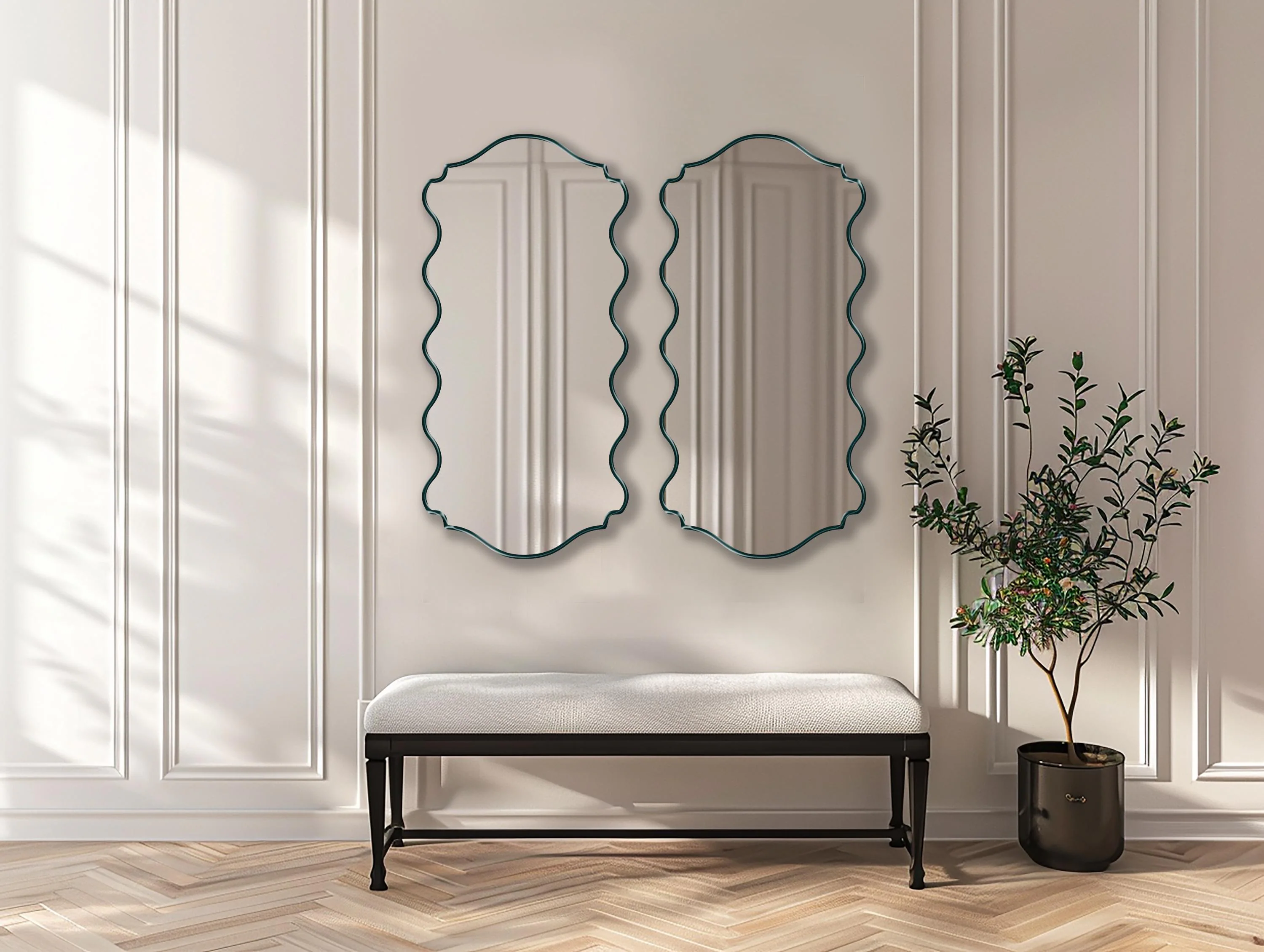 Two Ribbed Mirrors with emerald frame finish hung on the wall of an entryway over a bench.