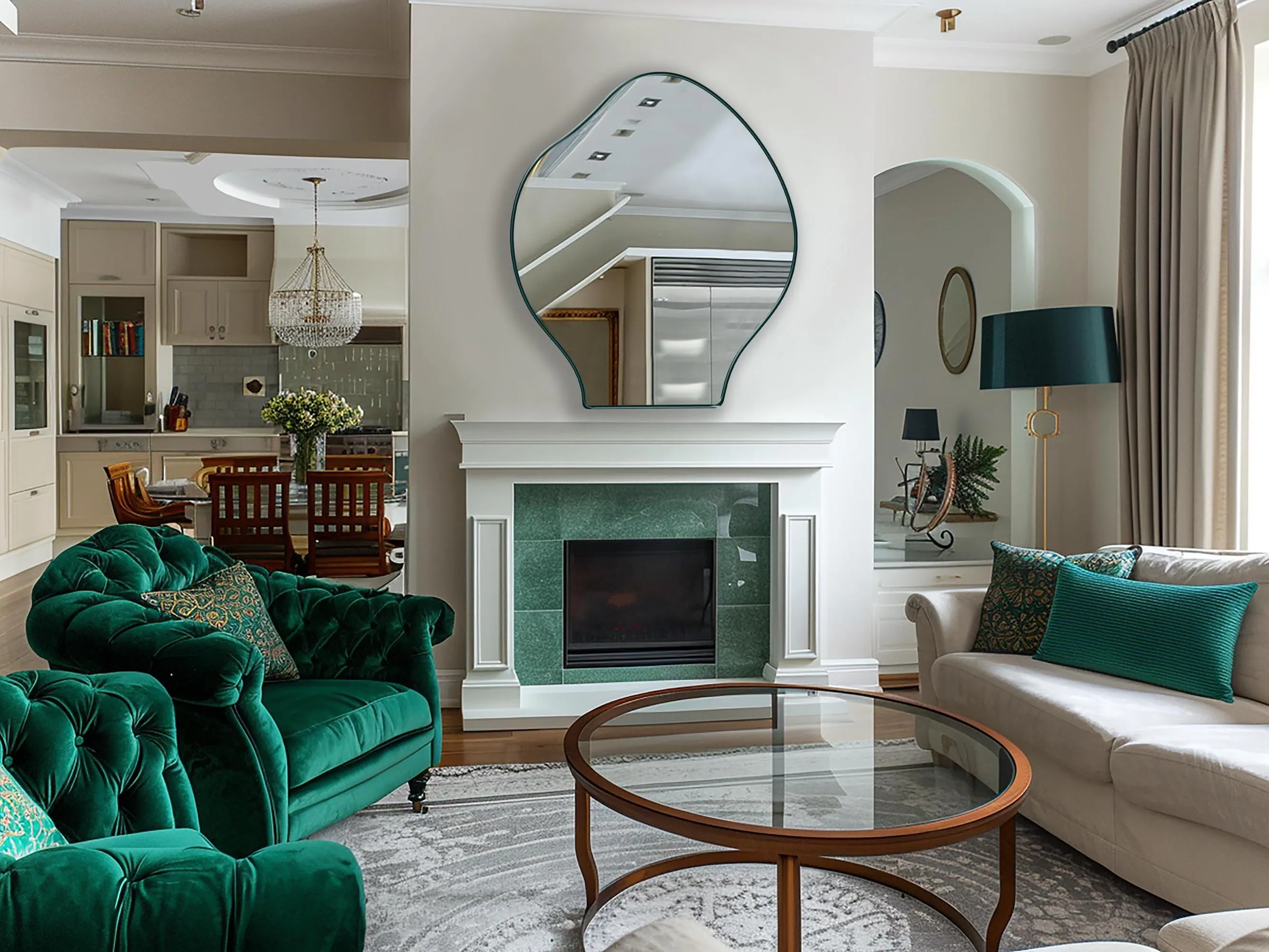 Pisces mirror with emerald frame finish hung on the wall of a living room over a fireplace.