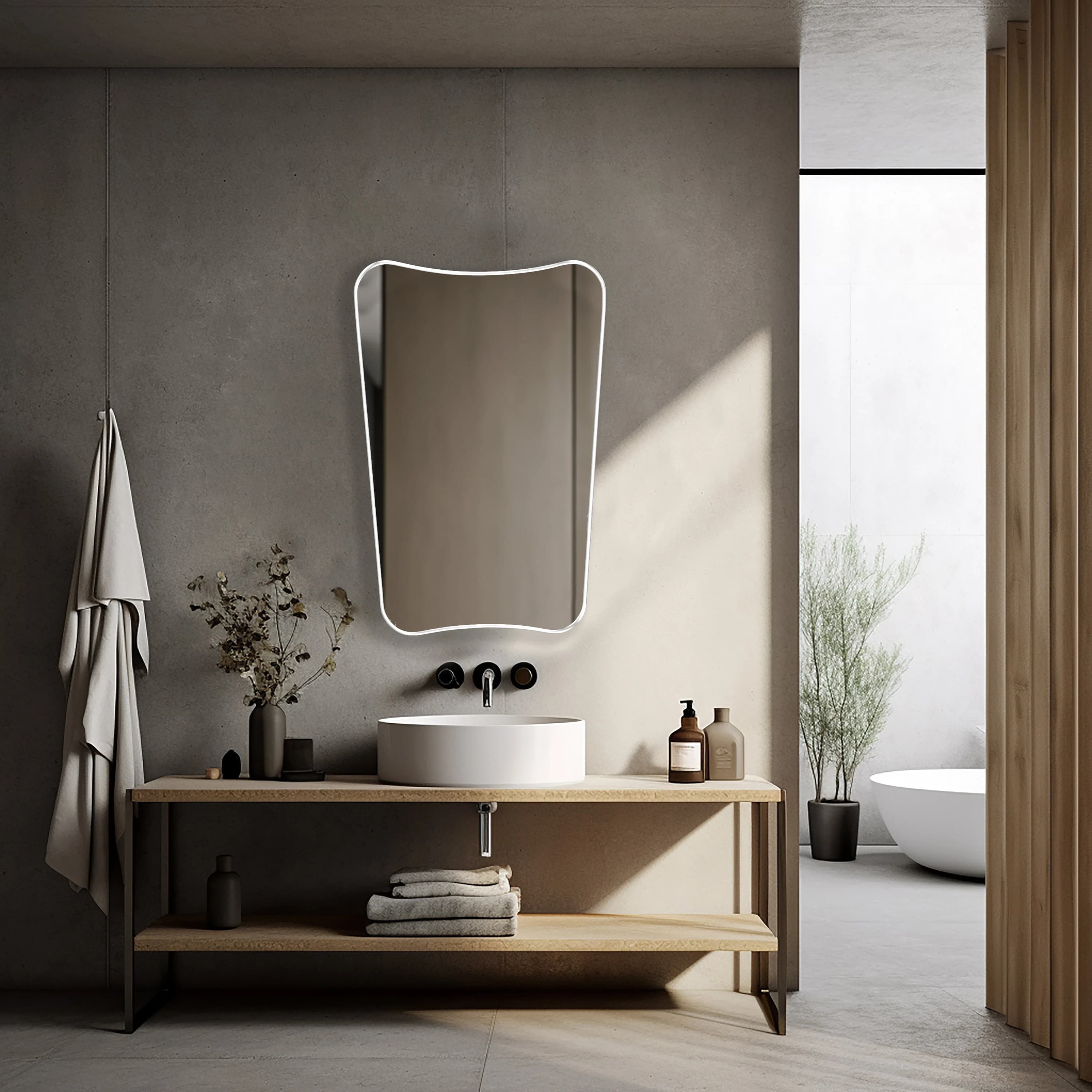 Italian style mirror with white frame hung on a bathroom wall.