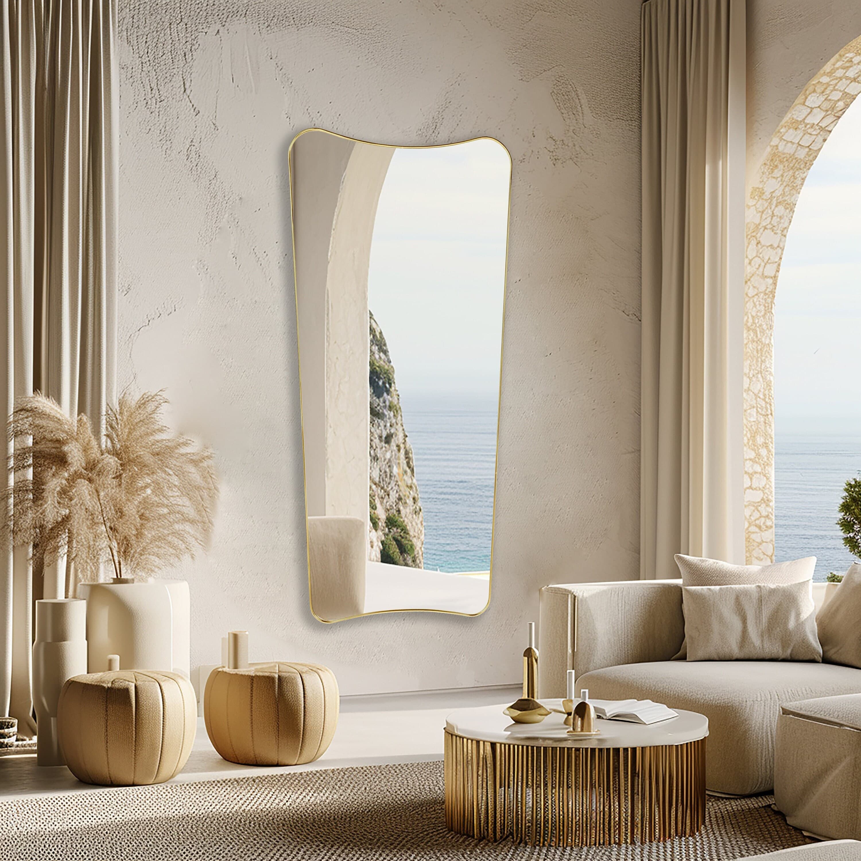 Italian style Full Length Mirror with gold frame hung on a terrace, next to the sea.