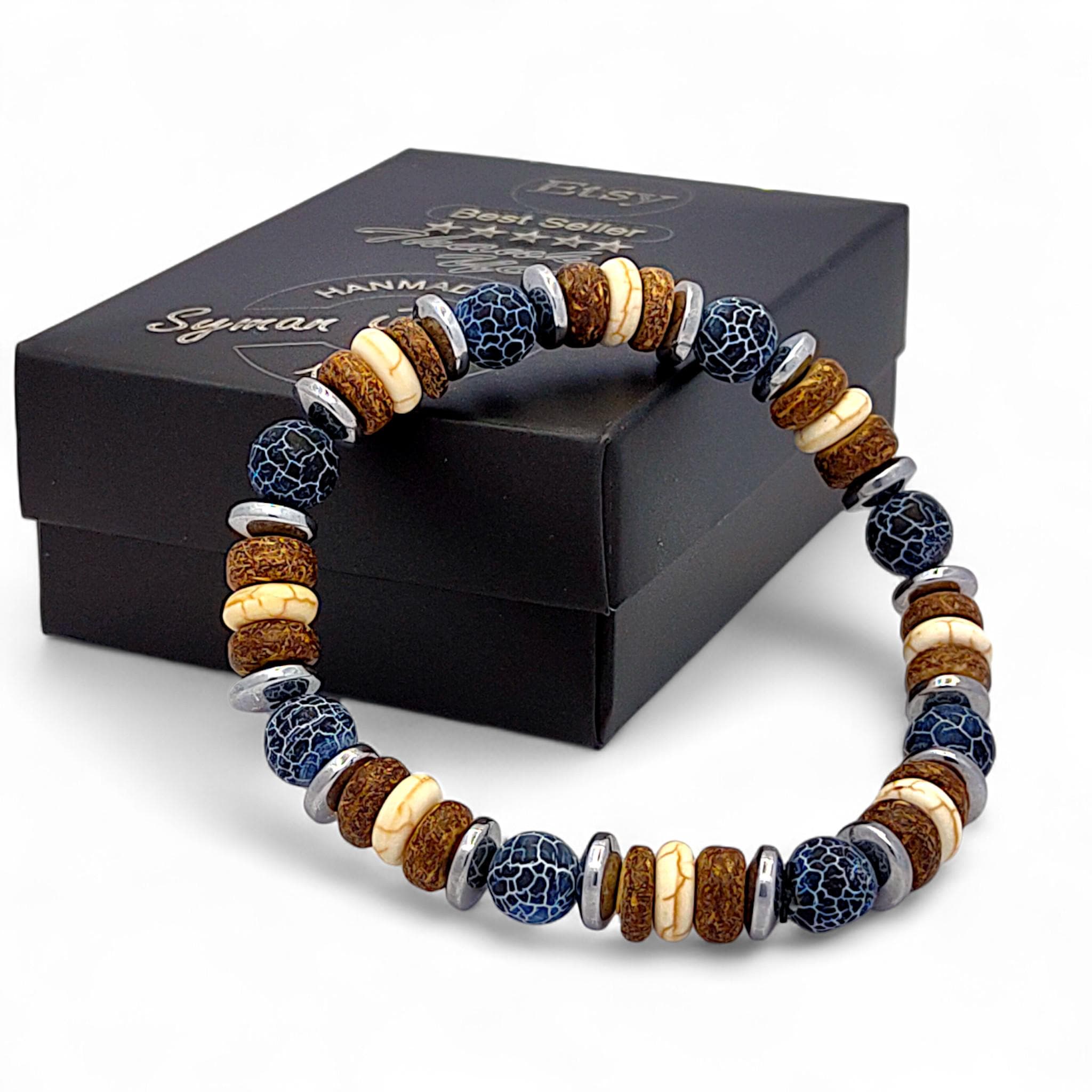 Handmade men's bracelet with matte crackle black agate, sandalwood, white turquoise, and silver hematite beads for a minimalist boho look.