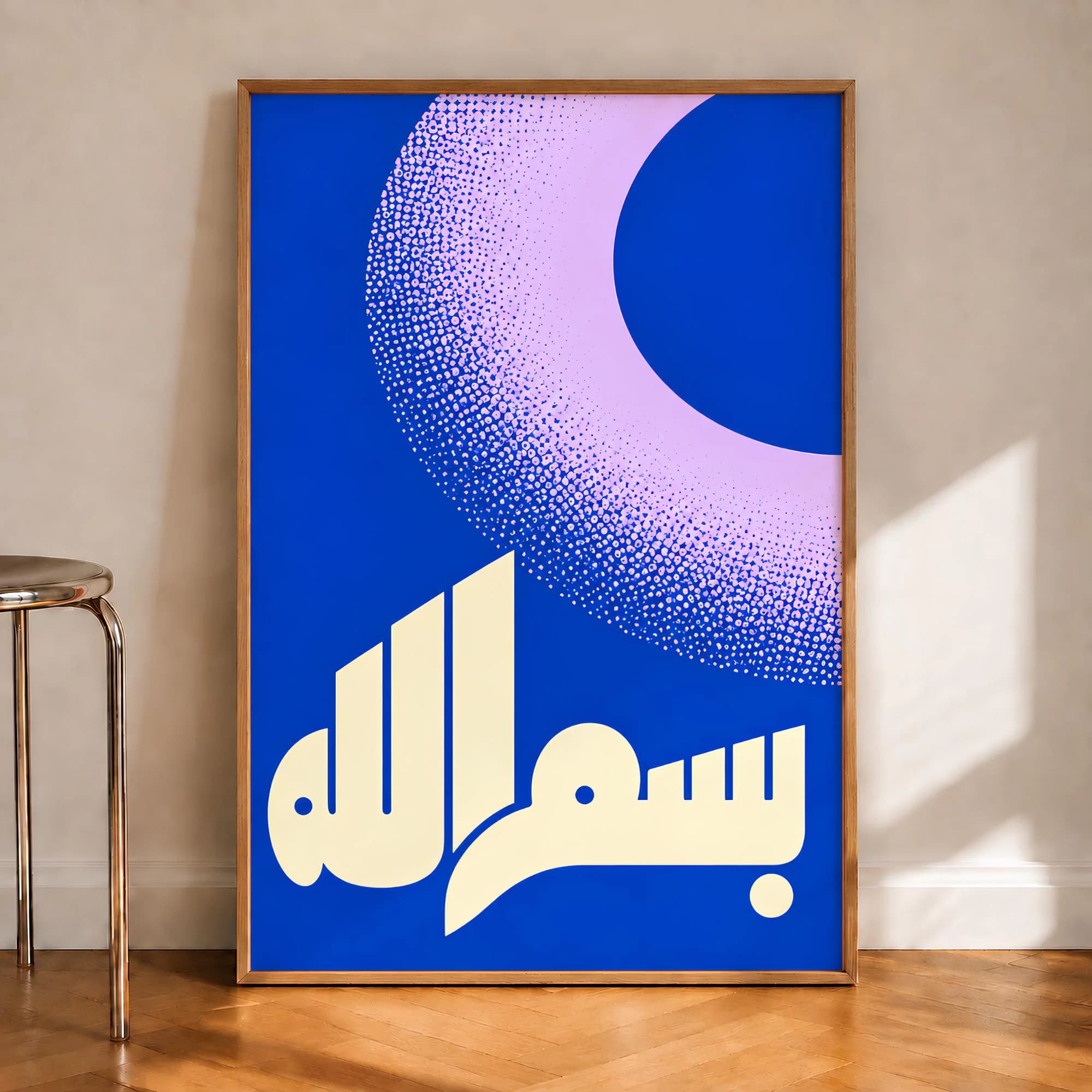 A rectangular framed wall art piece featuring a vibrant blue background with a large, light purple crescent shape composed of dense stippled dots. Below the crescent, the Arabic calligraphy for Bismillah is rendered in cream.