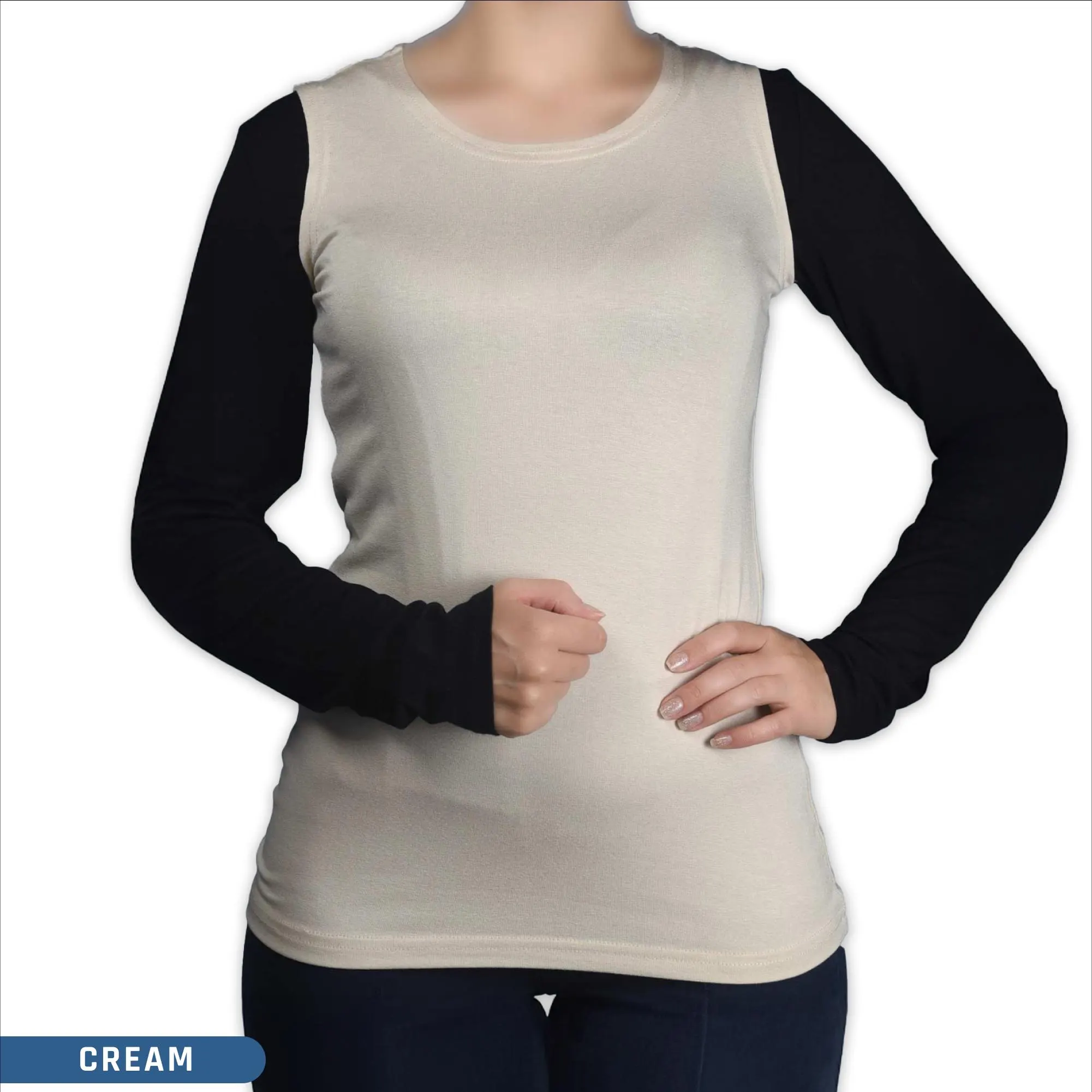 A woman wearing a sleeveless cream viscose crew neck body top ,a modest layering style for hijab clothing.