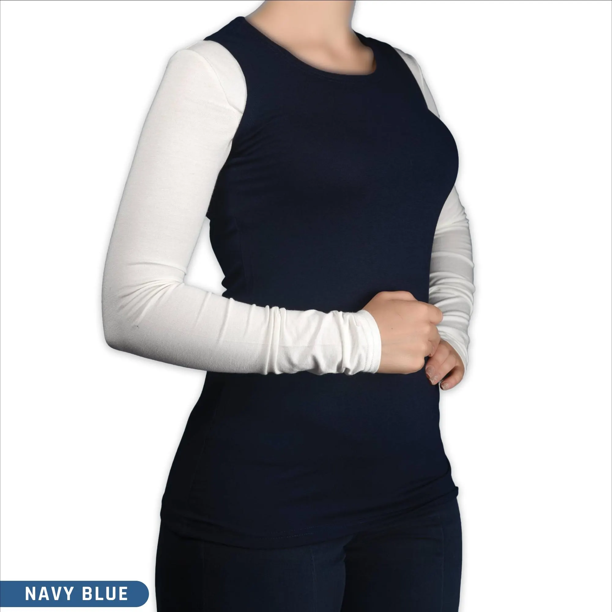 A woman wearing a sleeveless navy blue viscose crew neck body top ,a modest layering style for hijab clothing.