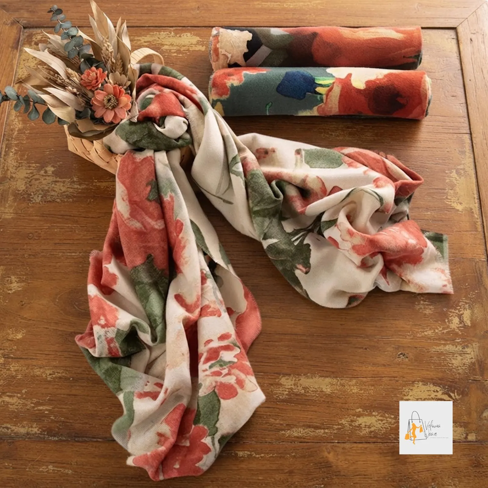 Oversized scarf worn over a casual autumn outfit.