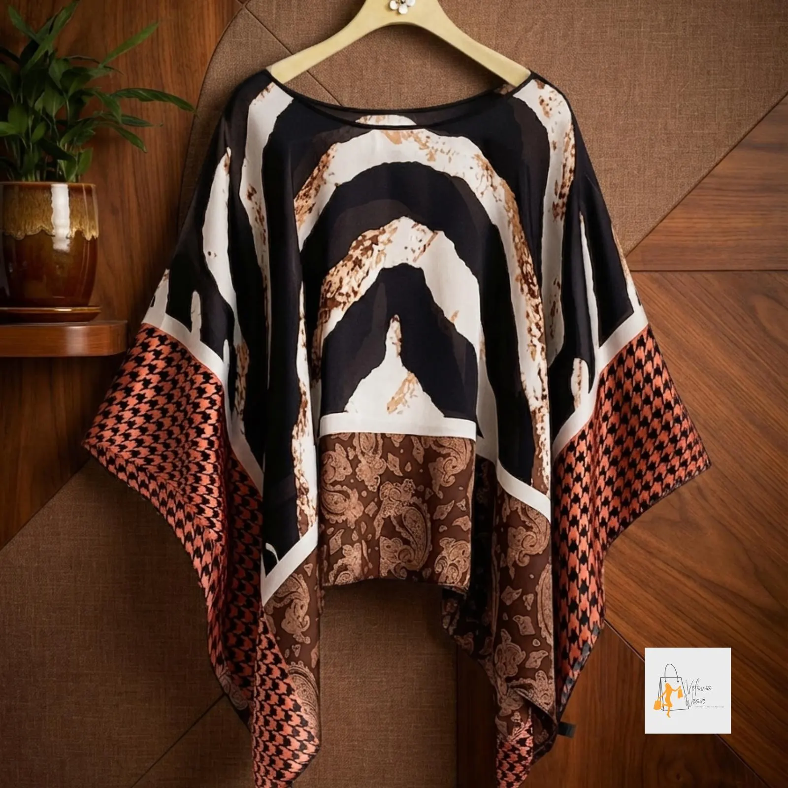 Lightweight women's cape styled for everyday wear.