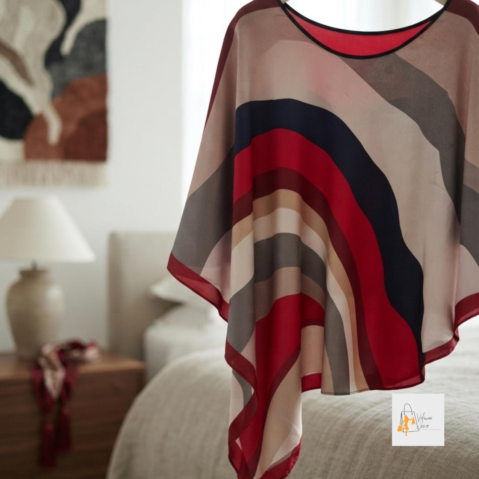Hooded shawl paired with jeans for a relaxed look.