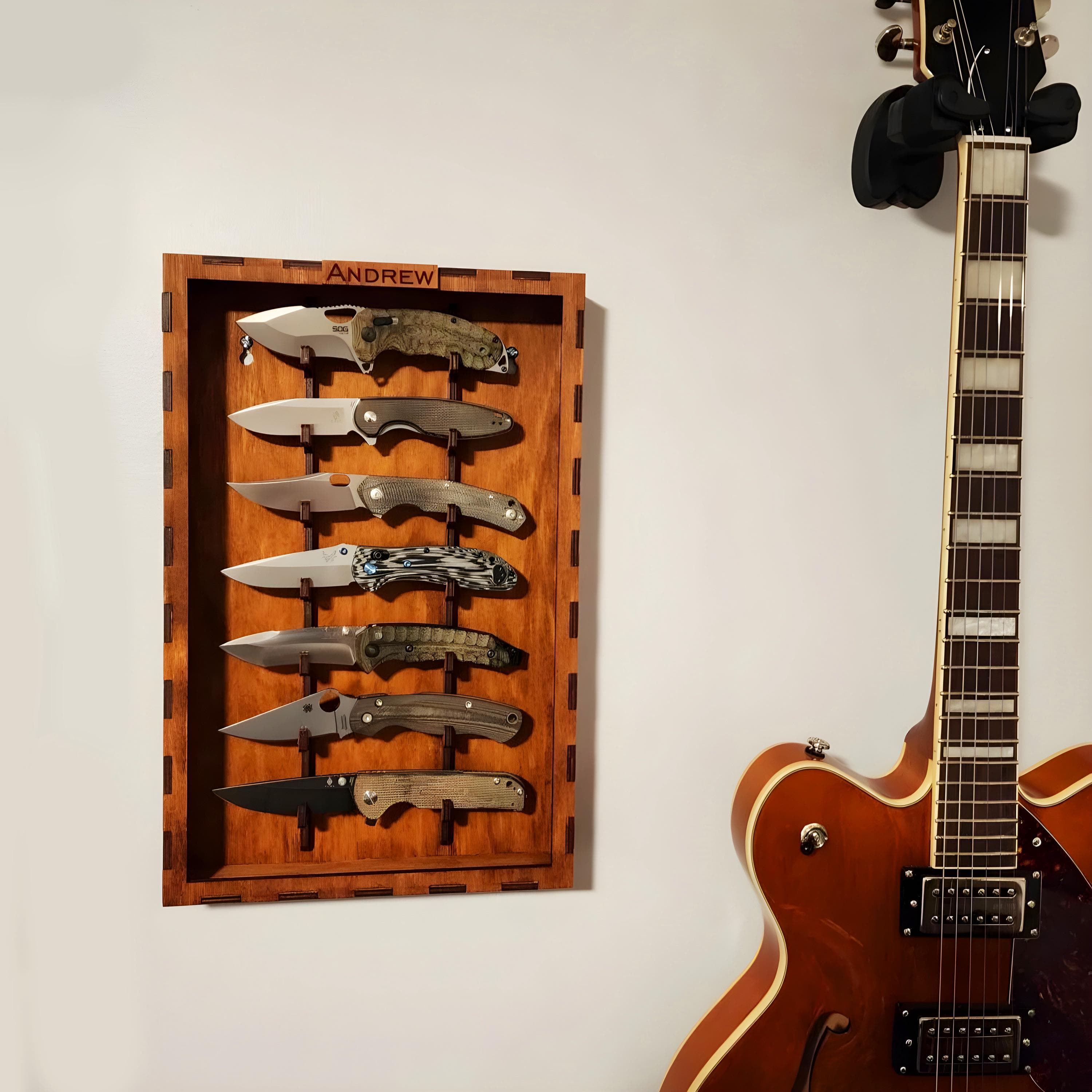 Display your knives in style with this Custom Knife Display Stand made from high-quality plywood. Featuring a sleek design and available in 10 colors of plywood, this knife organizer is perfect for showcasing your pocket knives. Sized at 16.7" x 10.8" x 2.4" (42.5 x 27.5 x 6.1 cm), it can be wall mounted for versatile placement. Personalized options available to make it unique. Ideal for knife storage and a must-have for any pocket knives collector.