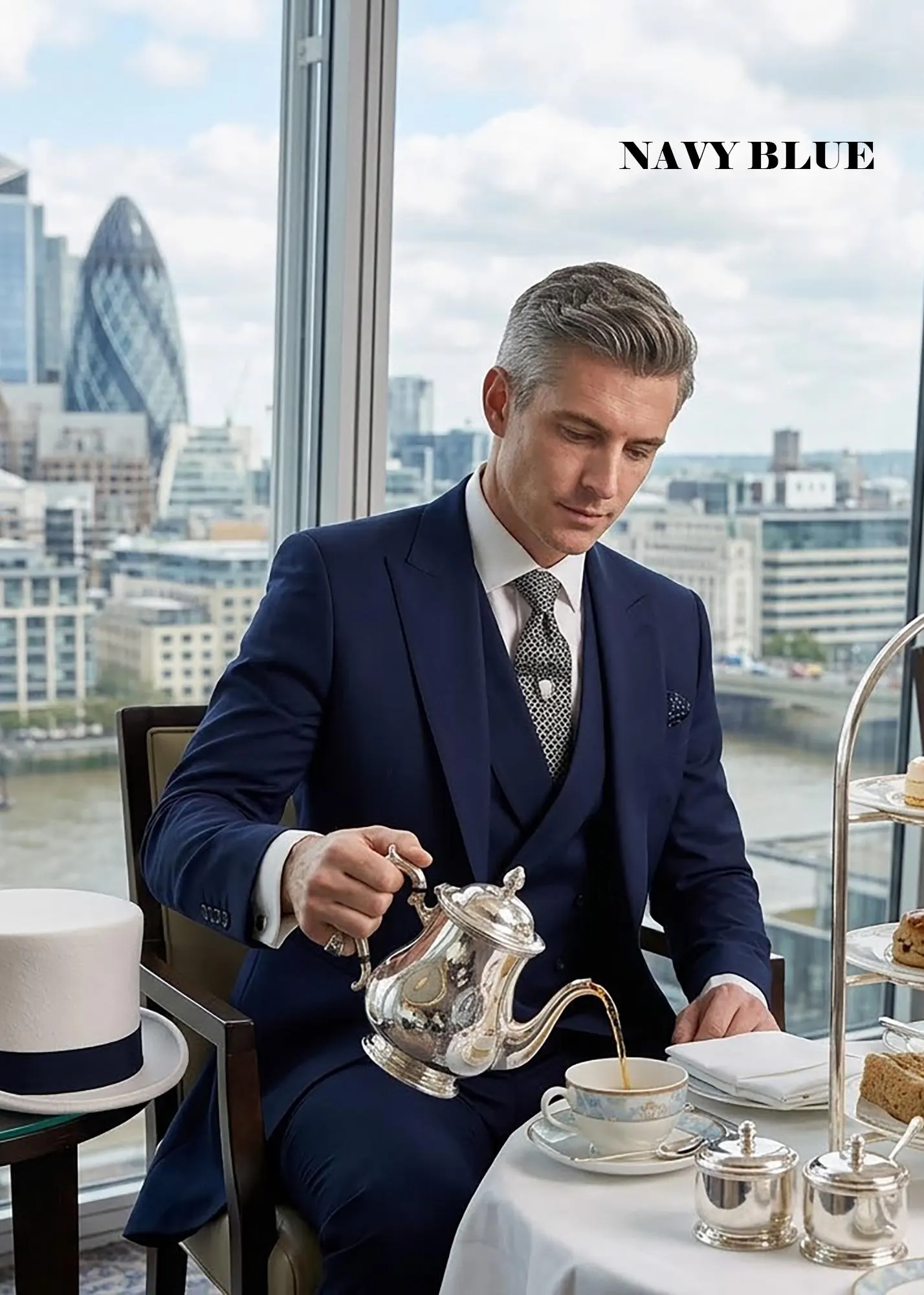 A professional studio shot of a 3-piece men's suit set including a blazer, waistcoat, and trousers displayed on a mannequin.