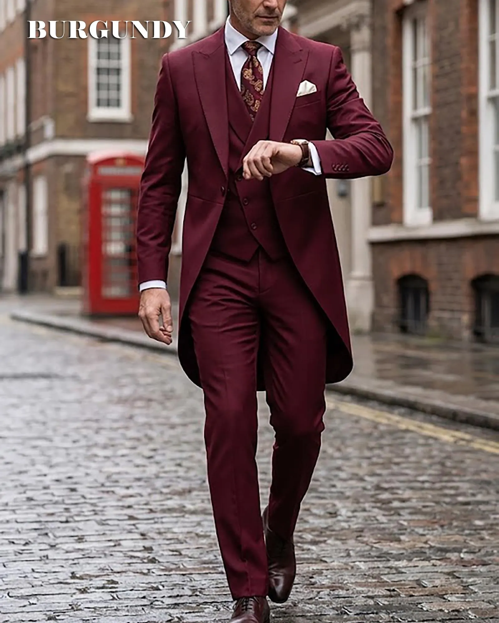 A professional studio shot of a 3-piece men's suit set including a blazer, waistcoat, and trousers displayed on a mannequin.
