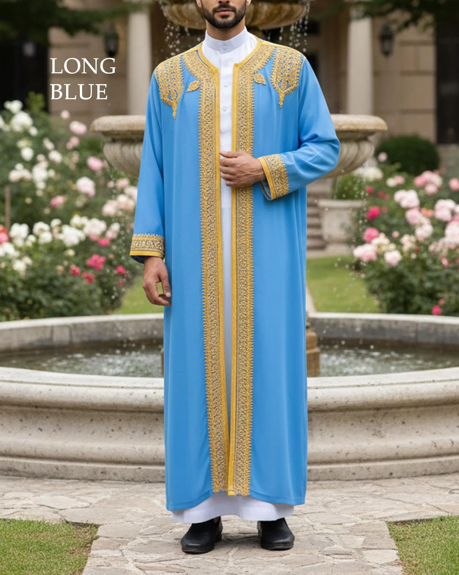 A man wearing a long-sleeve thobe with intricate embroidery on the stand collar and chest area, showcasing a loose-fit ethnic silhouette