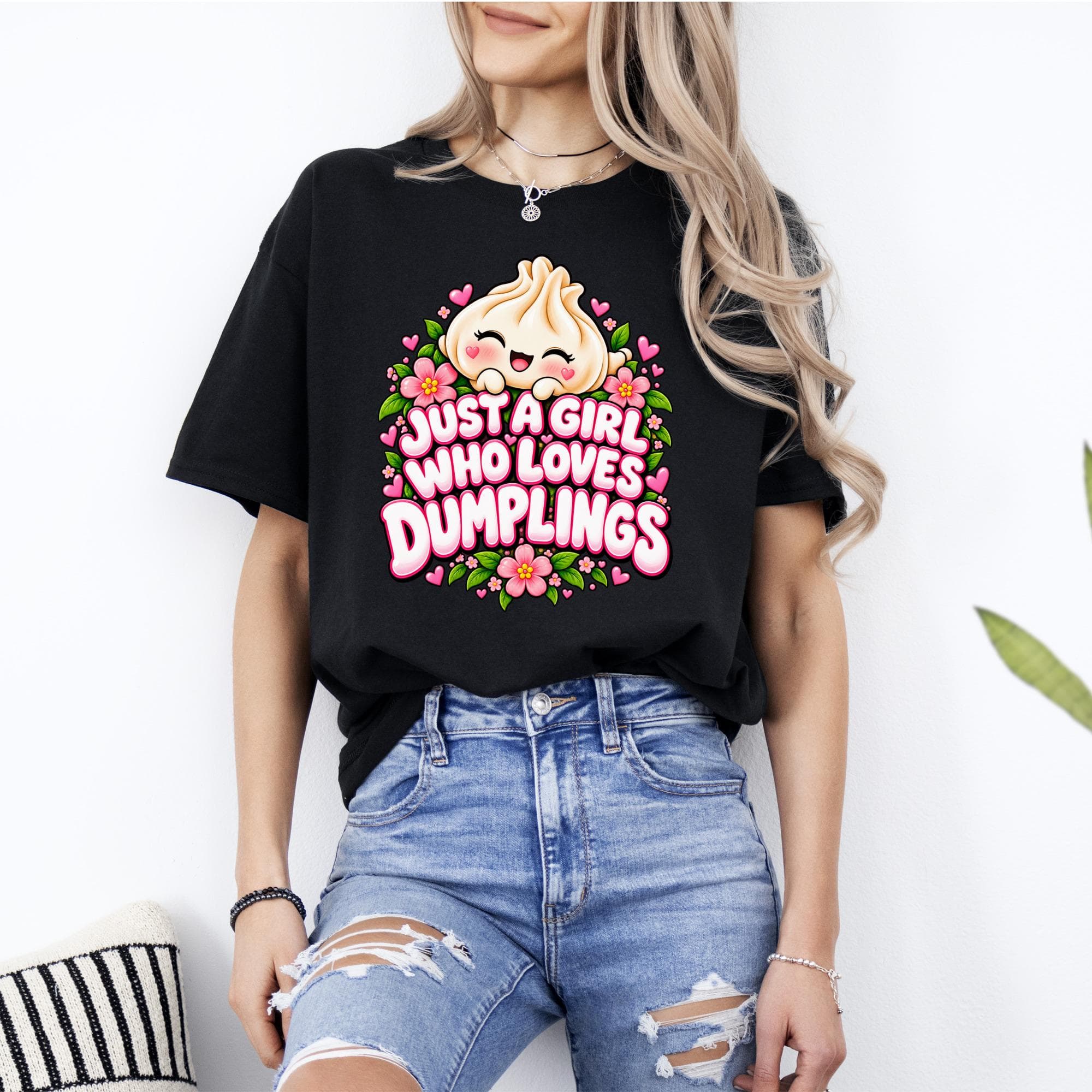 Black t-shirt with a kawaii dumpling and text that says "Just a girl who loves dumplings."