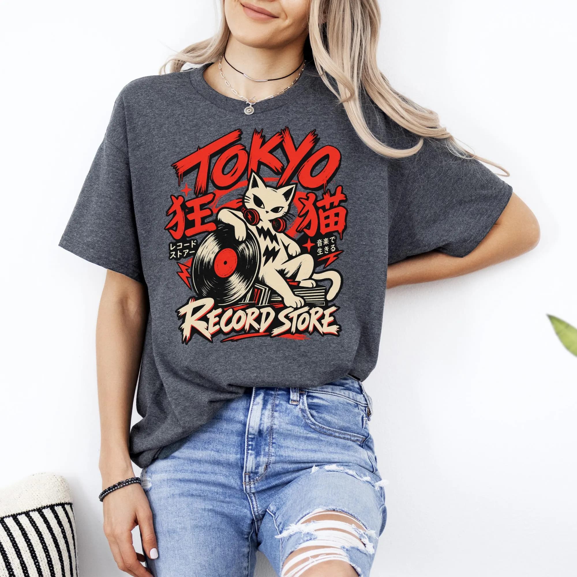 T-shirt graphic: cat with headphones holds record, text reads TOKYO RECORD STORE