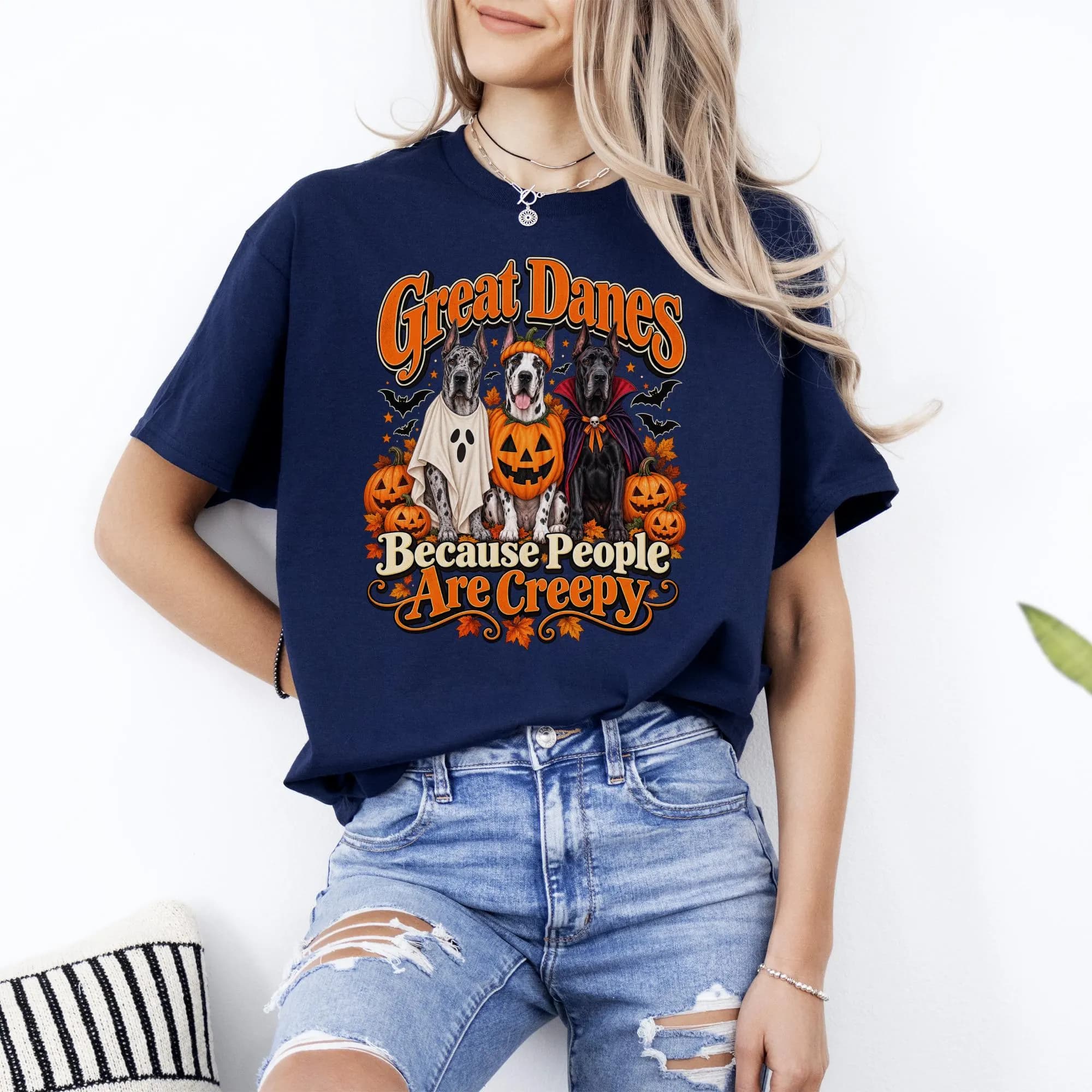 Great Danes in Halloween costumes with text "Great Danes Because People Are Creepy".